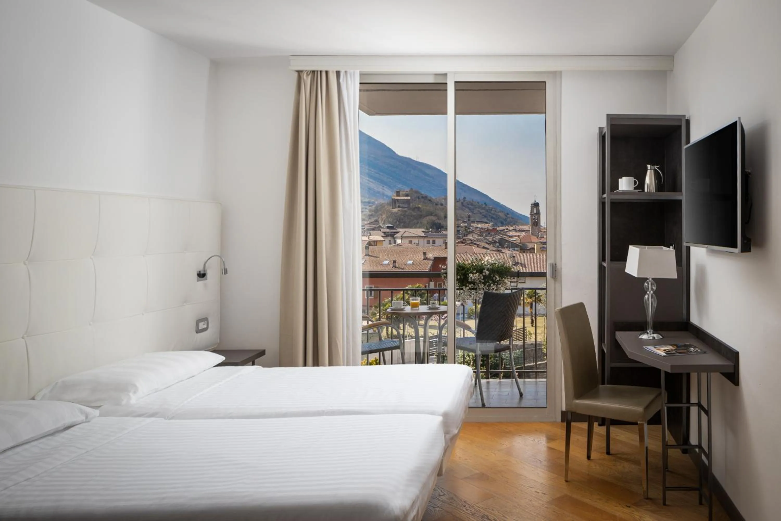 Bedroom, Bed in Hotel Continental - Tonelli Hotels