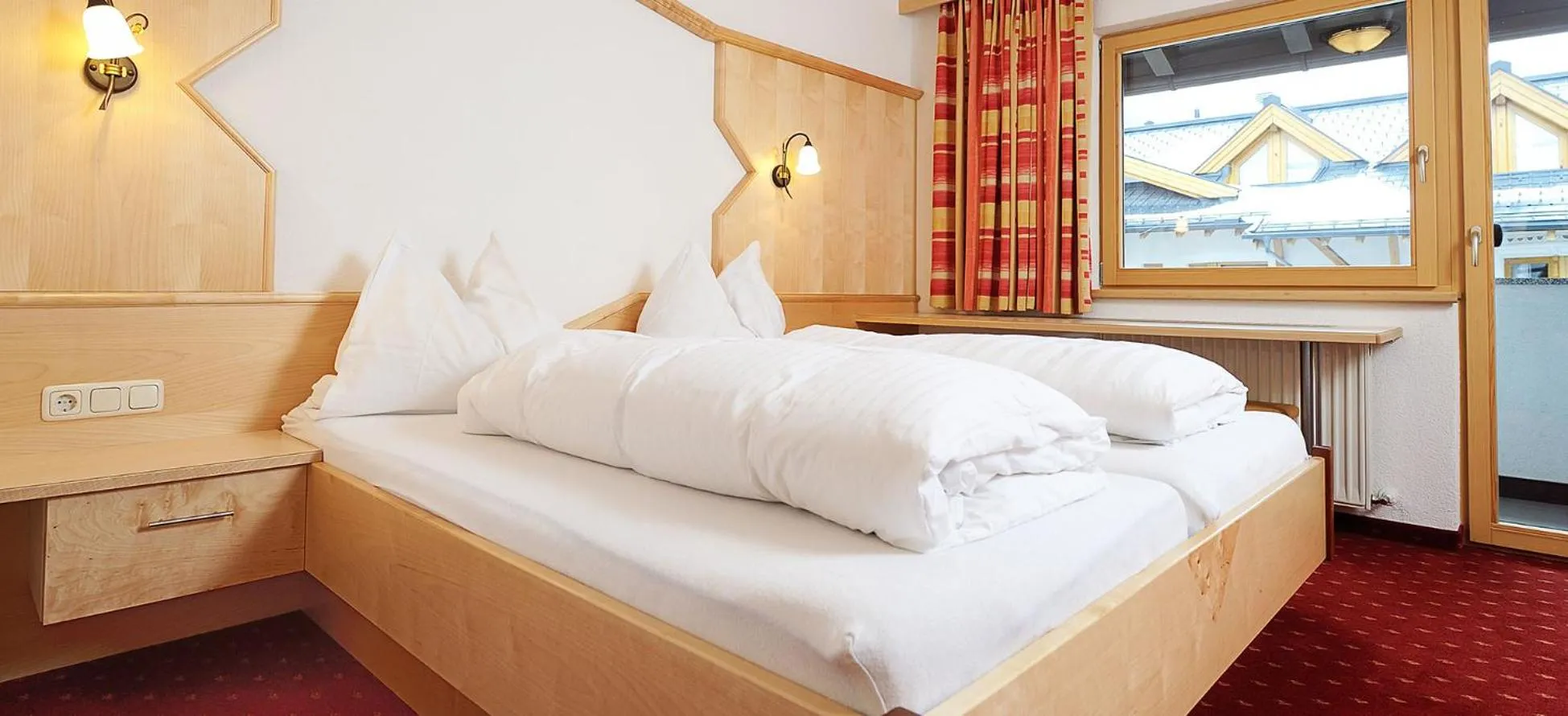 Bed in Hotel Kristall B&B