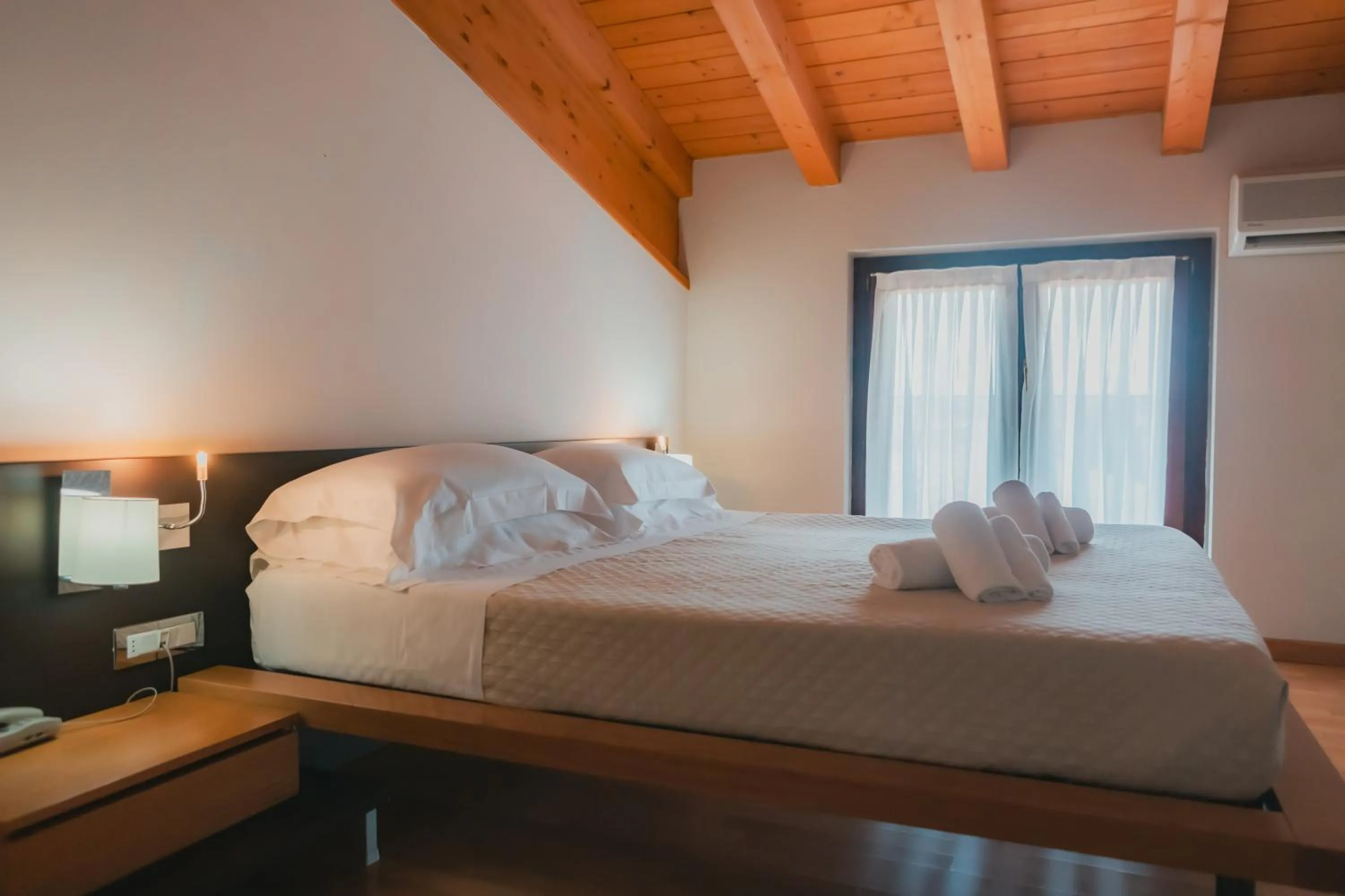 Bed in AHG Donna Silvia Wellness Hotel