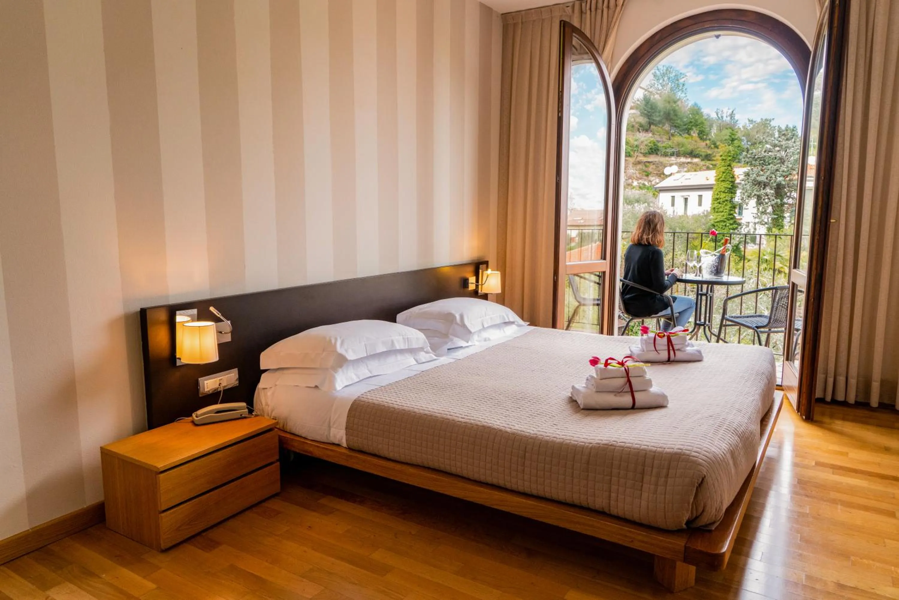 Balcony/Terrace, Bed in AHG Donna Silvia Wellness Hotel