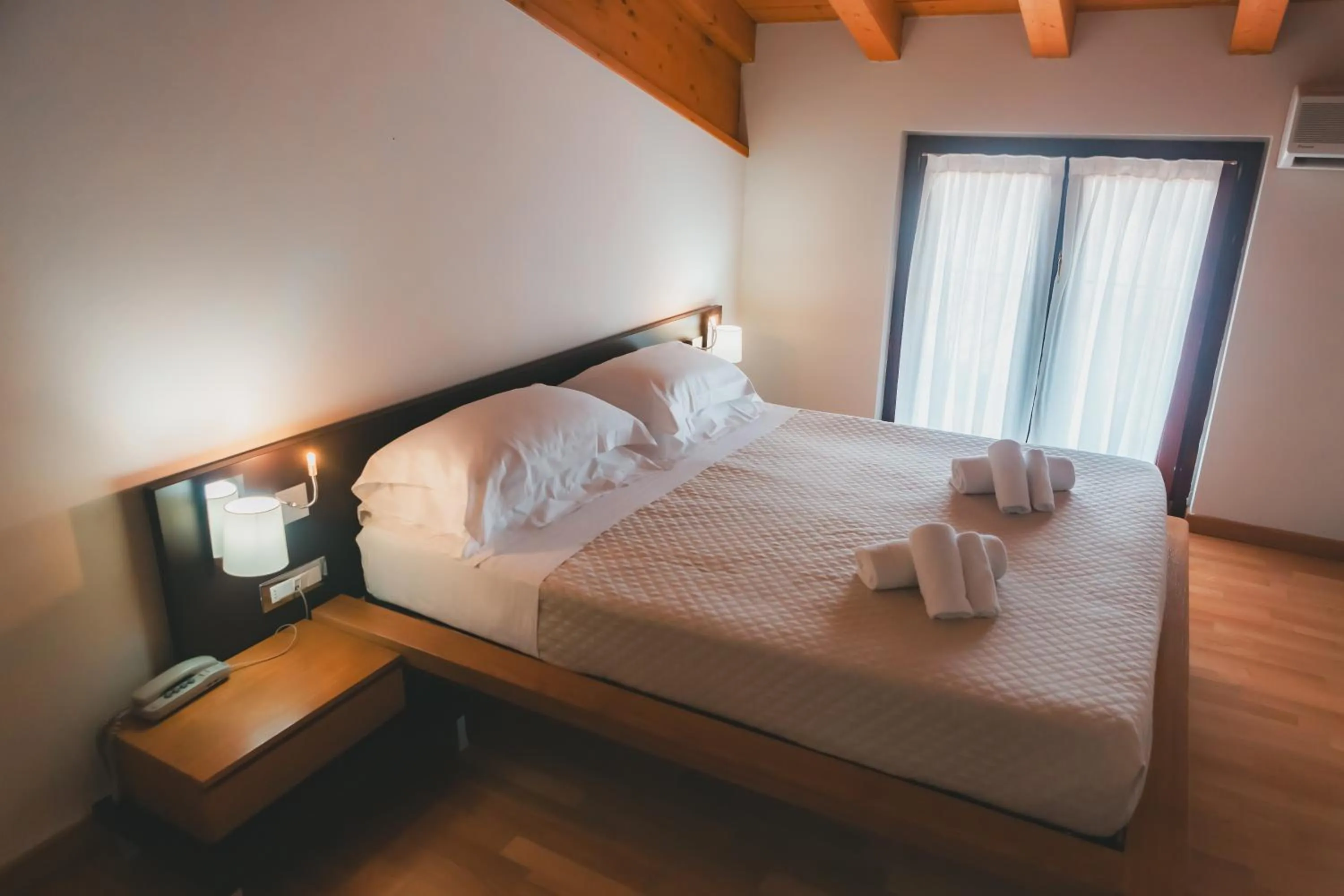 Bed in AHG Donna Silvia Wellness Hotel