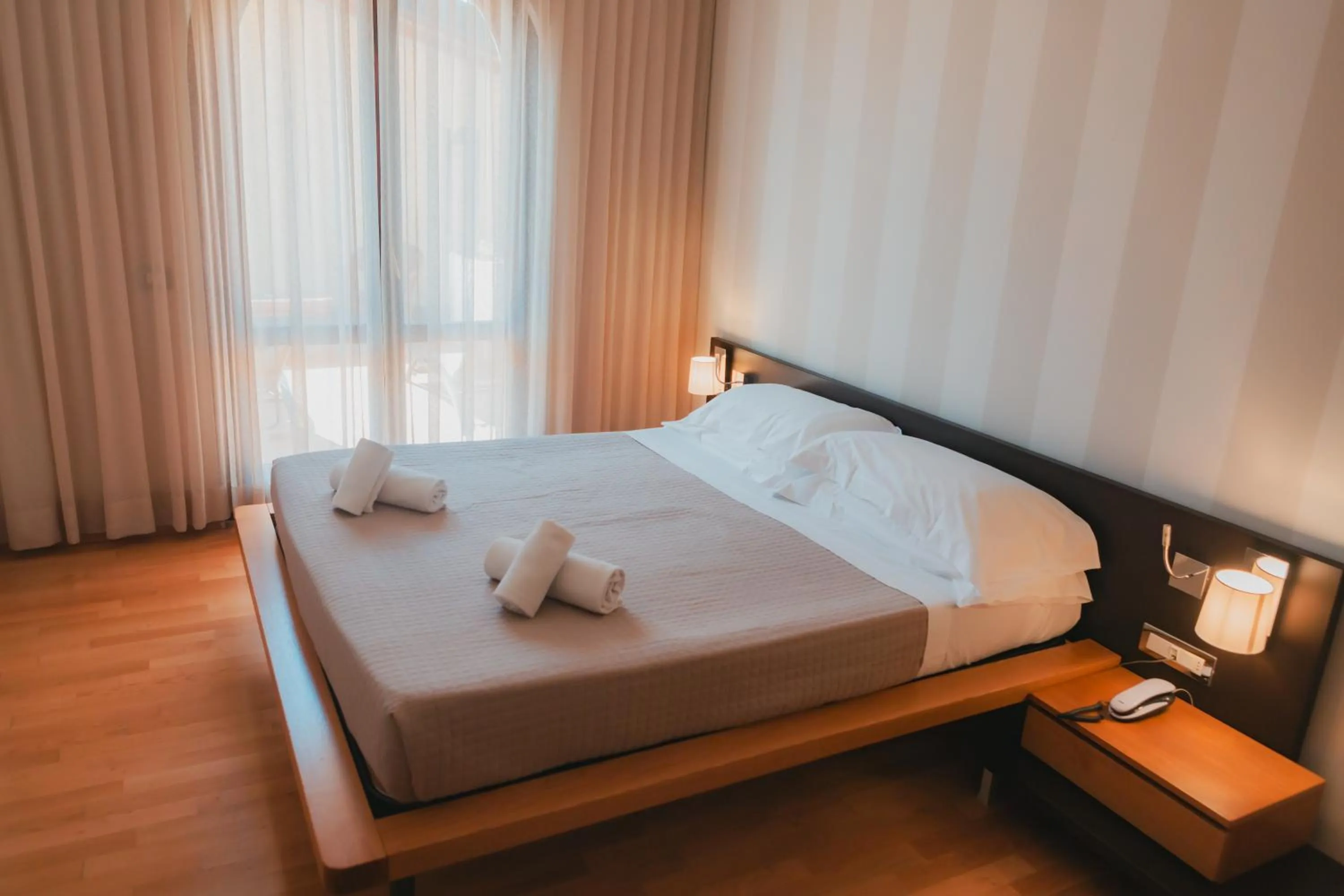 Bed in AHG Donna Silvia Wellness Hotel