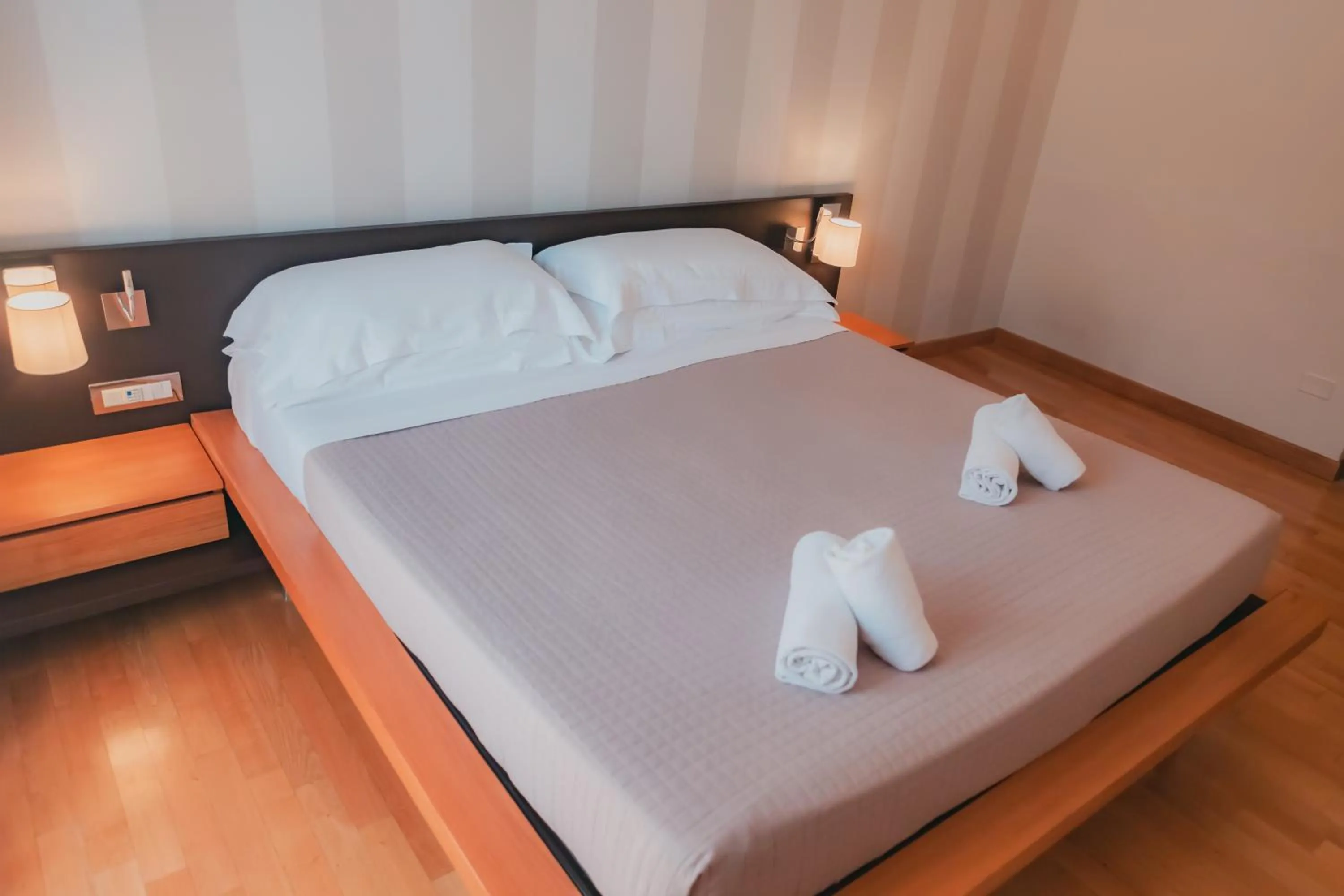 Bed in AHG Donna Silvia Wellness Hotel