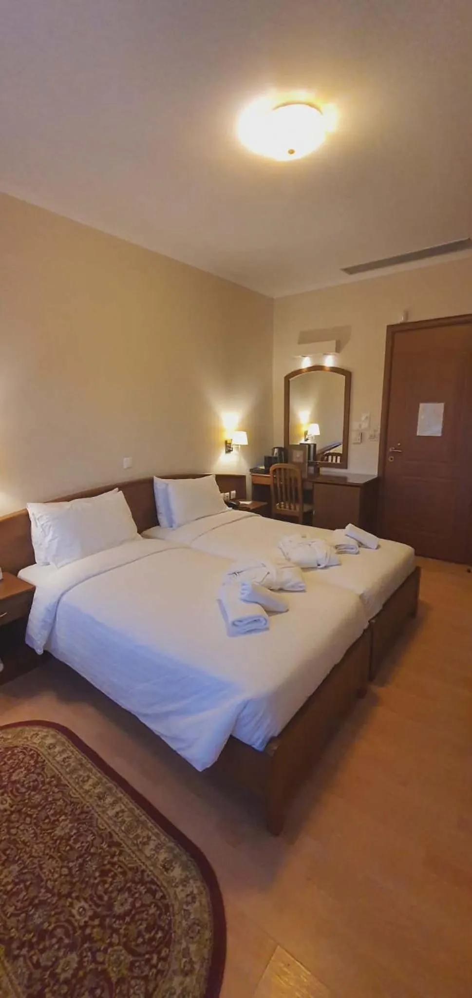 Bed in Xenios Dias Boutique Hotel