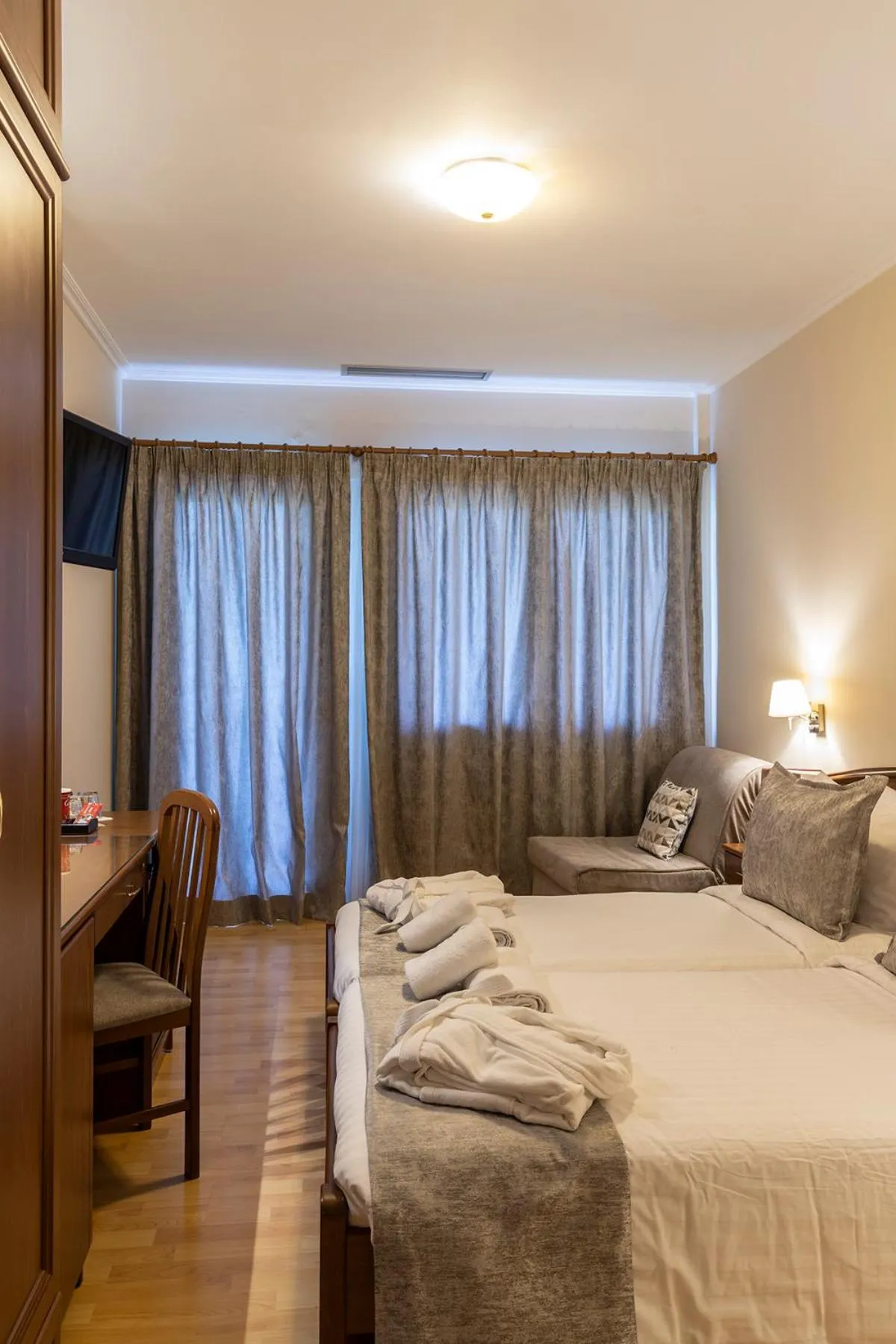 Bed in Xenios Dias Boutique Hotel