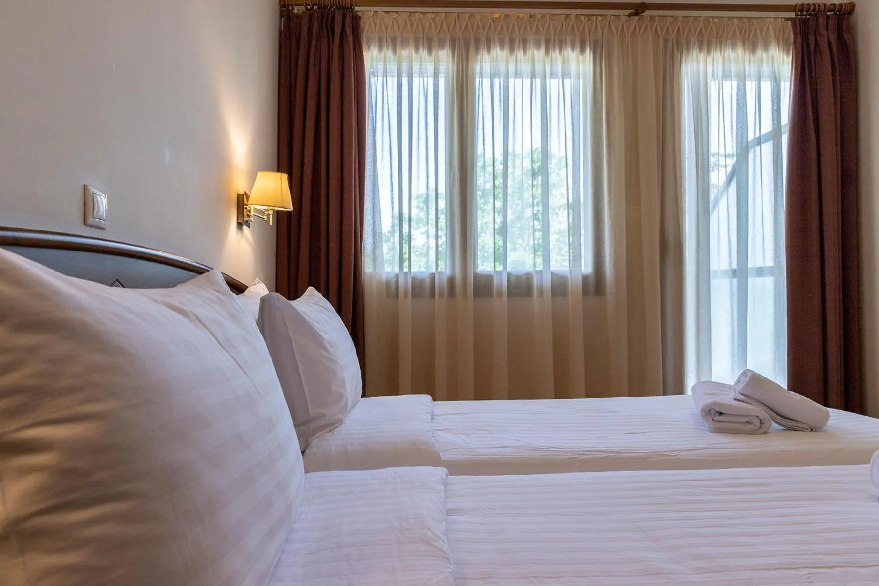 Bed in Xenios Dias Boutique Hotel