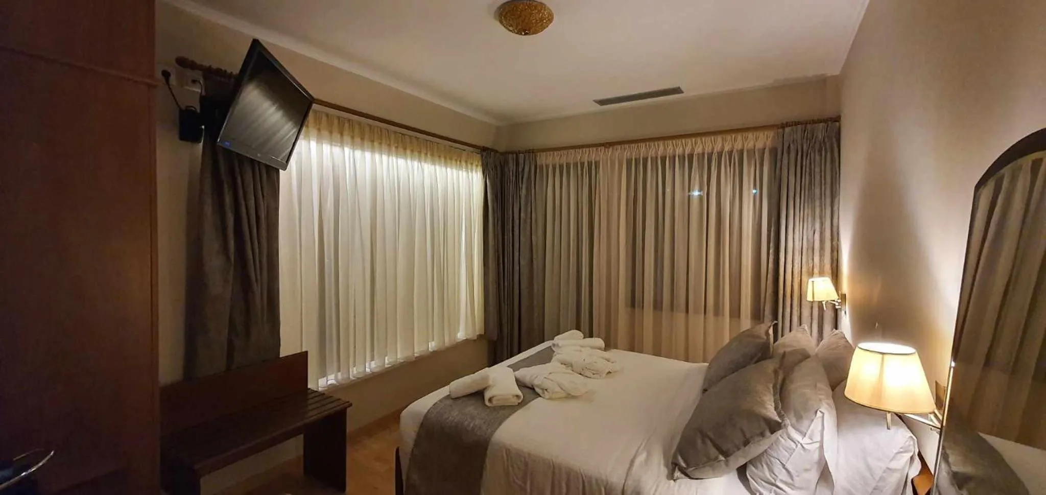 Bed in Xenios Dias Boutique Hotel