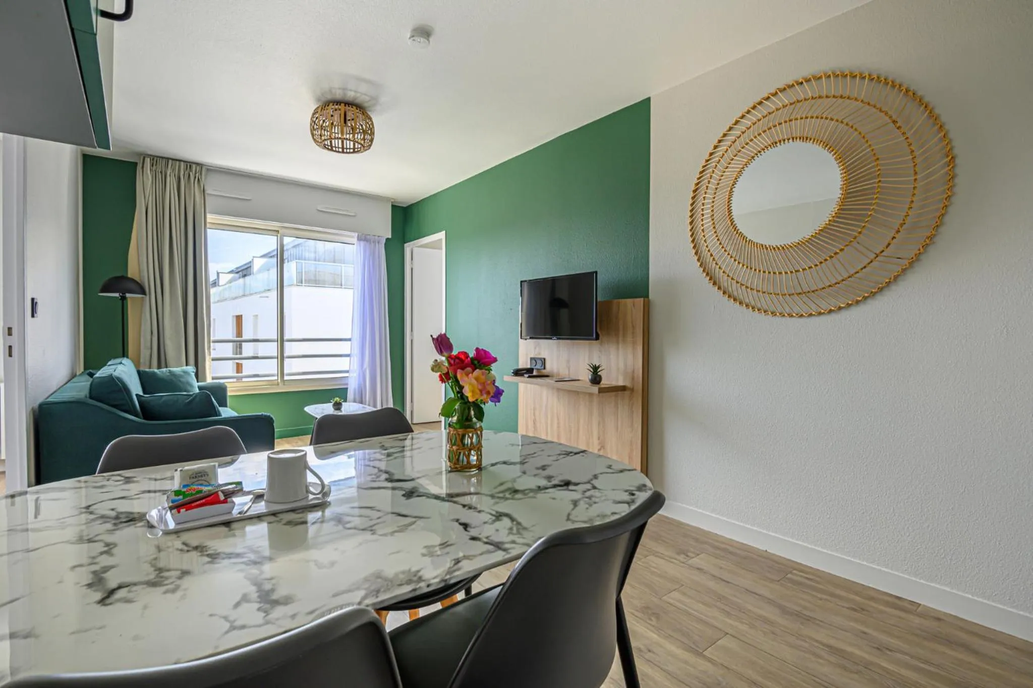 Communal lounge/ TV room in Appart Hôtel Le Liberté Vannes Centre-Ville