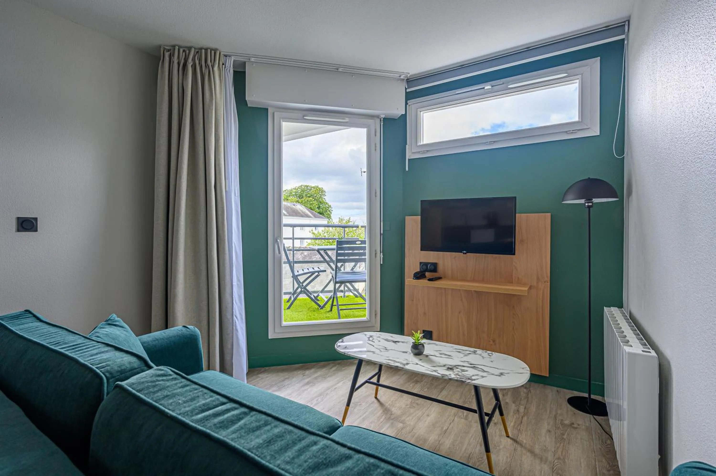 Living room in Appart Hôtel Le Liberté Vannes Centre-Ville