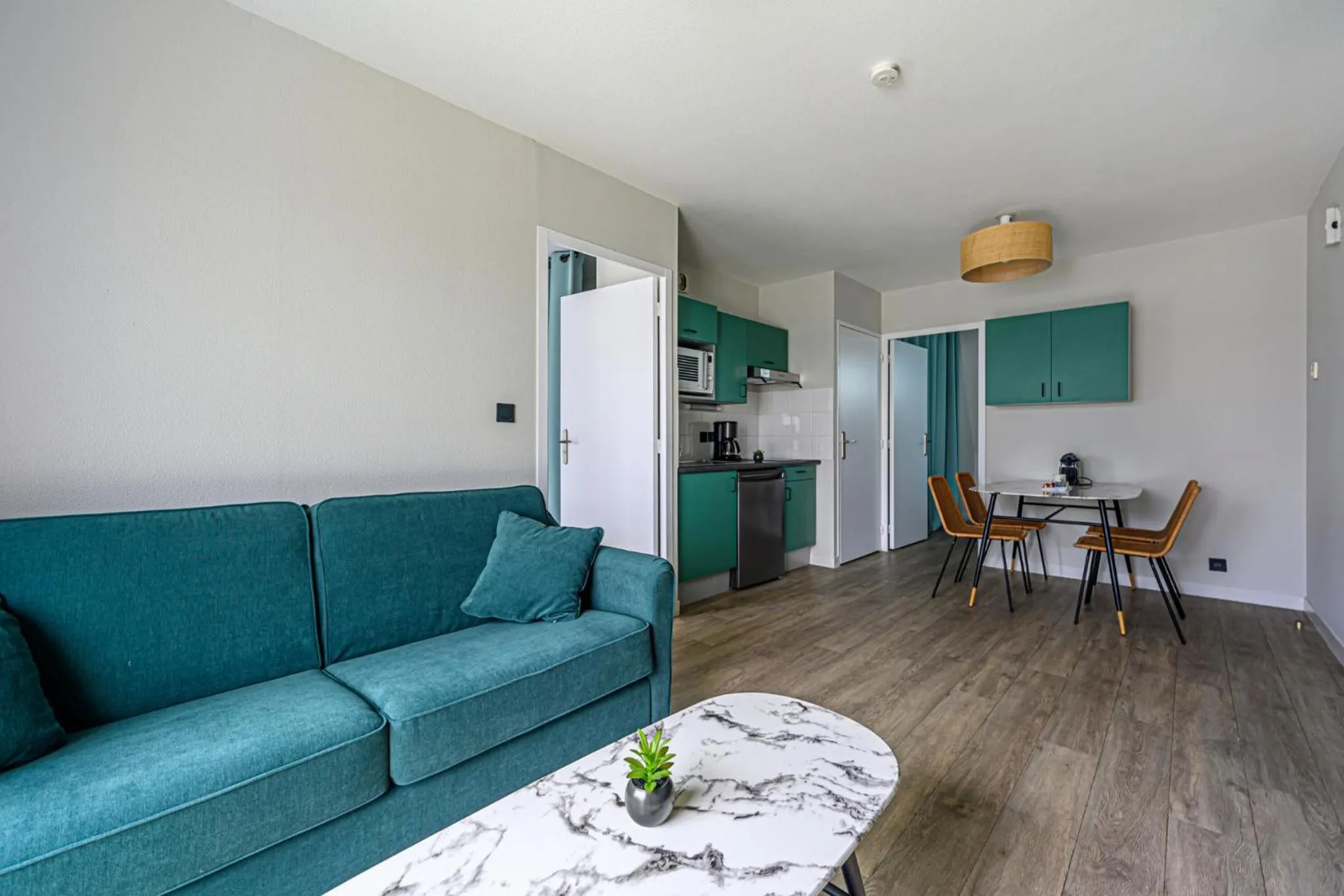 Living room in Appart Hôtel Le Liberté Vannes Centre-Ville