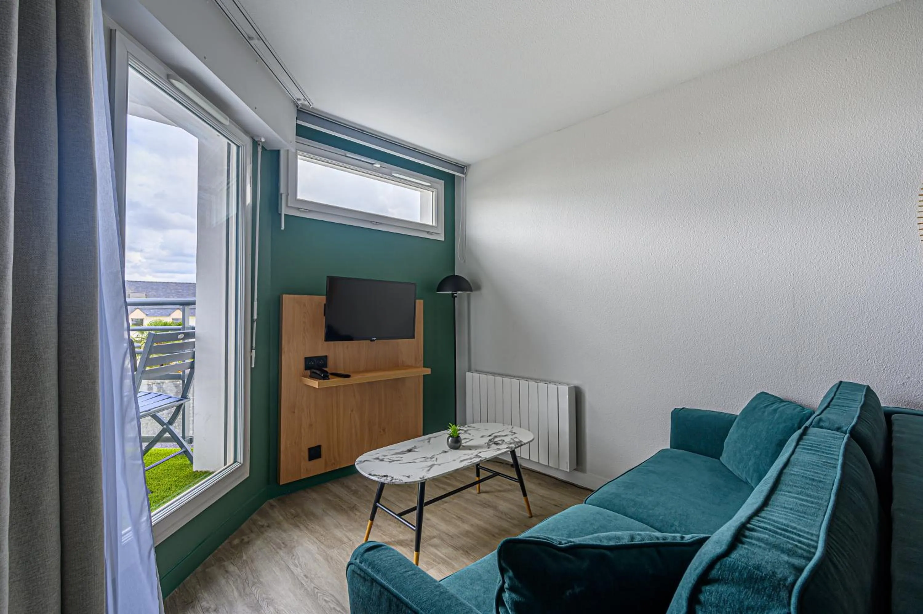 Living room in Appart Hôtel Le Liberté Vannes Centre-Ville