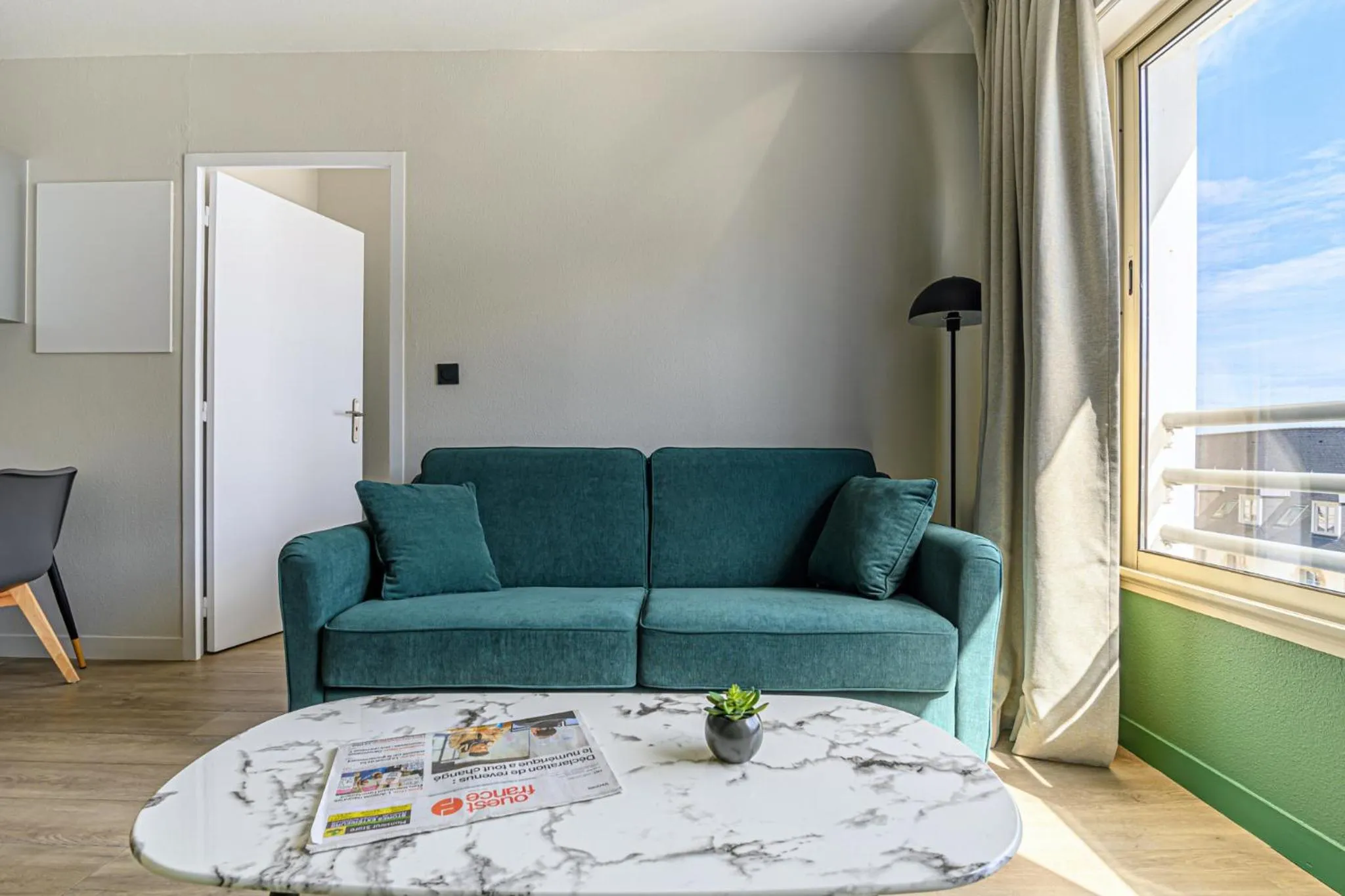 Living room in Appart Hôtel Le Liberté Vannes Centre-Ville