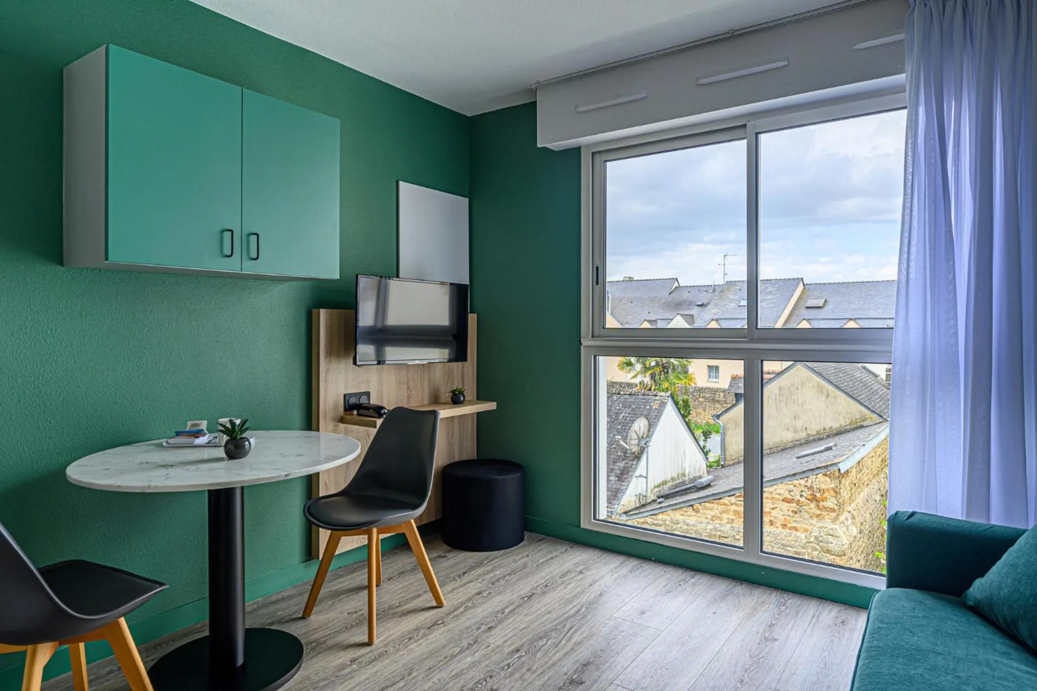 Living room in Appart Hôtel Le Liberté Vannes Centre-Ville
