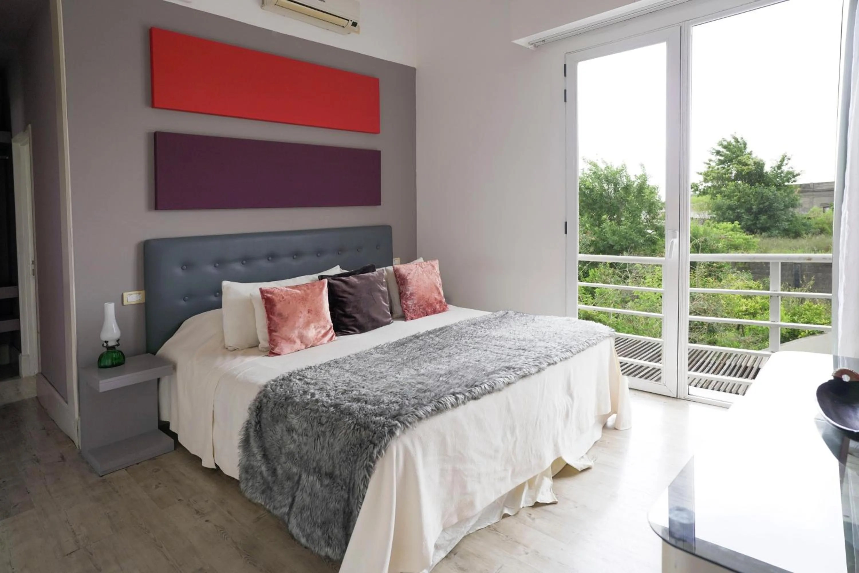 Bed in Los Muelles Boutique Hotel