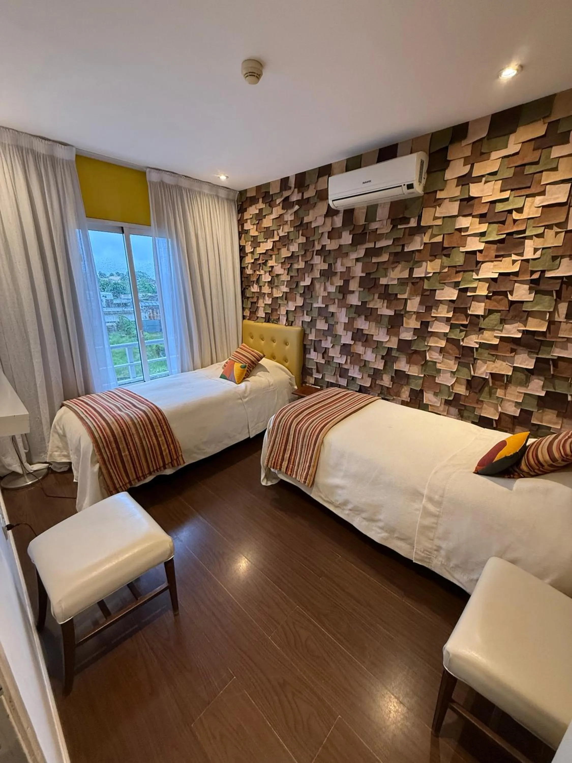 Bed in Los Muelles Boutique Hotel