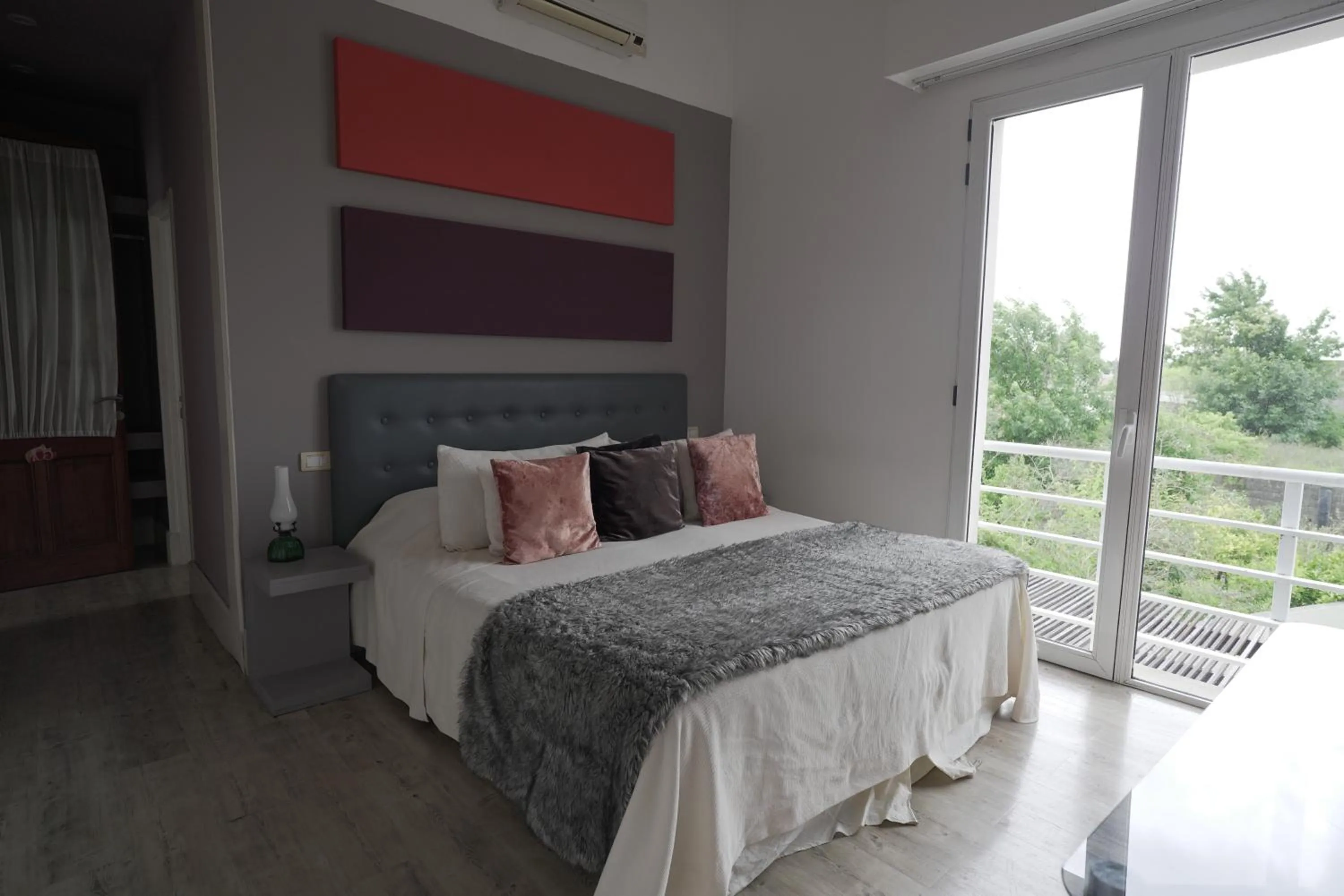 Bed in Los Muelles Boutique Hotel