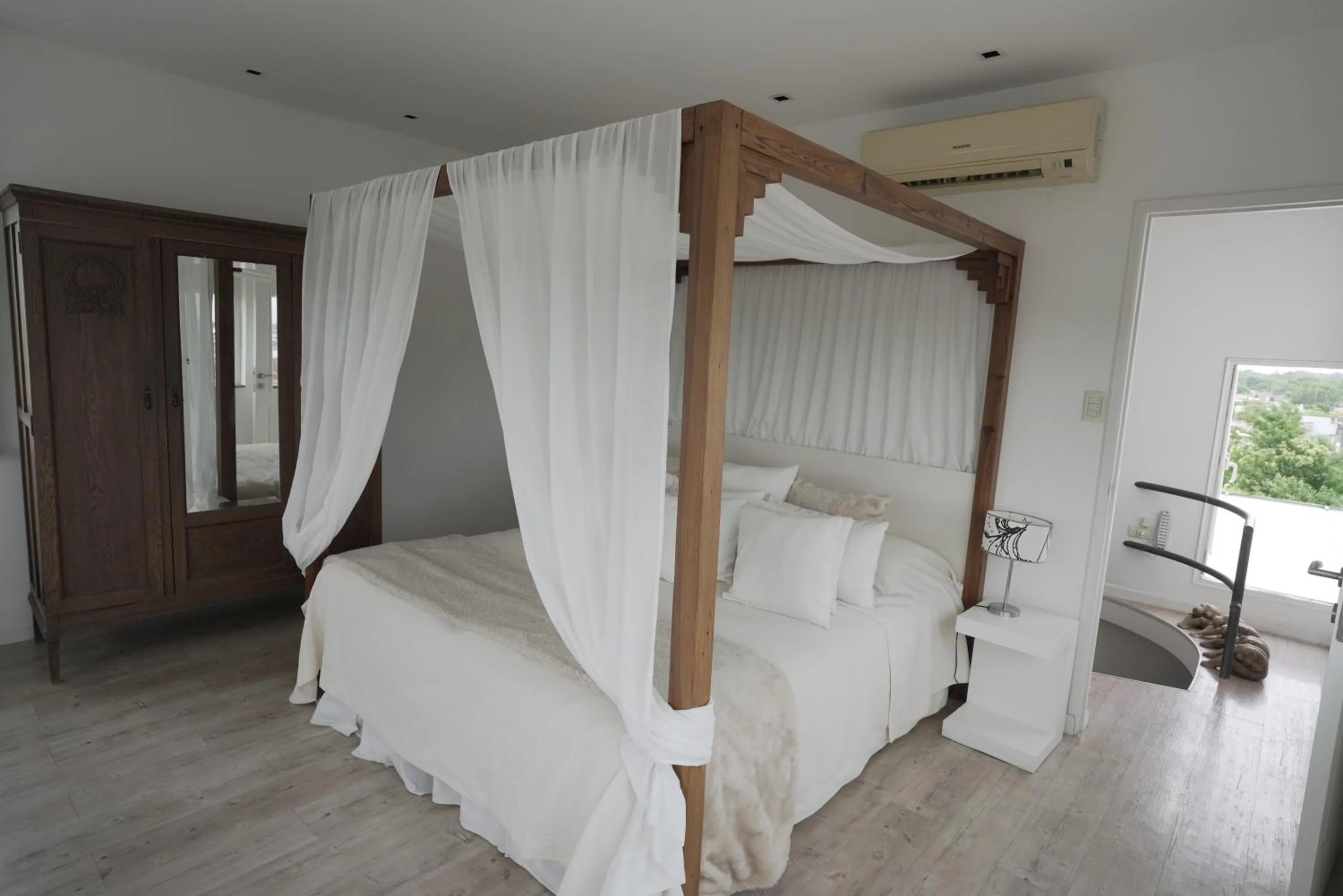 Bed in Los Muelles Boutique Hotel