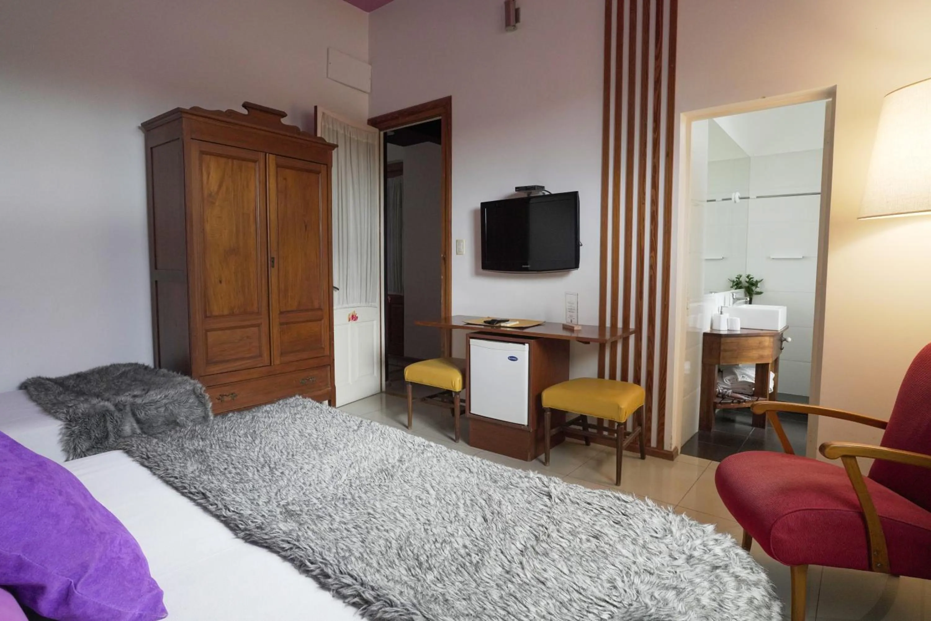 Bed in Los Muelles Boutique Hotel