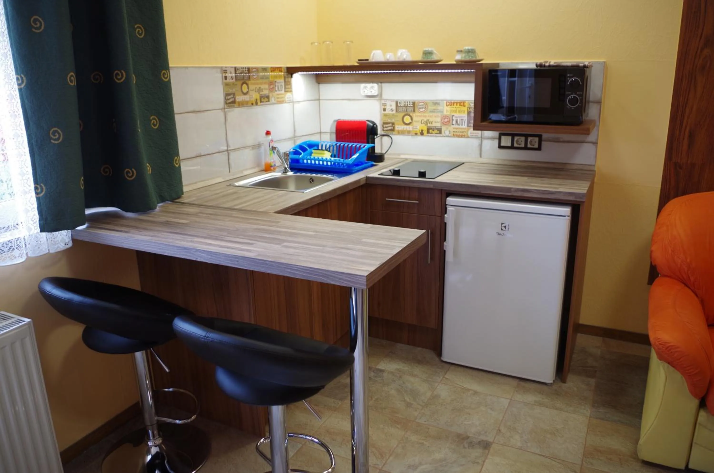 Kitchen or kitchenette in Aranyhal Apartman