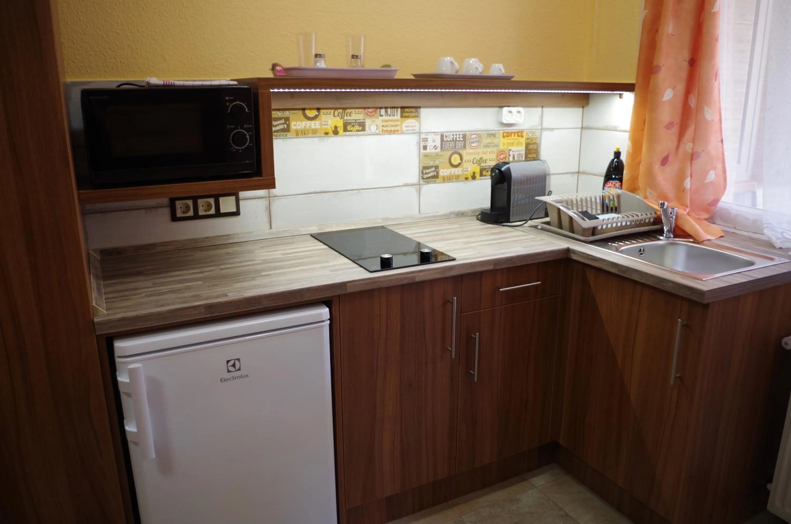 Kitchen or kitchenette in Aranyhal Apartman