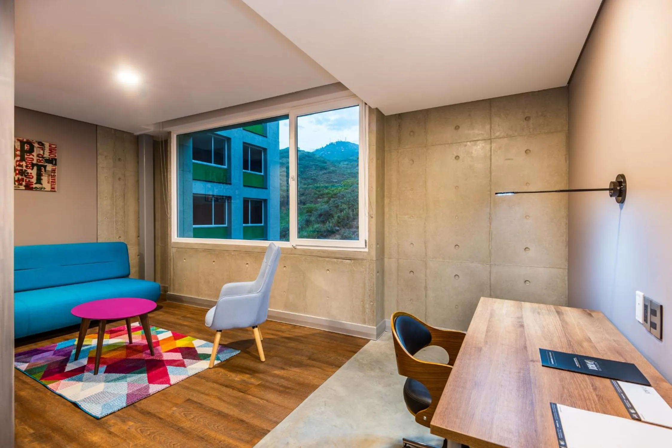 Living room in Hotel Spirito by Spiwak Chipichape