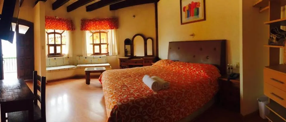 View (from property/room), Bed in Hotel Posada Don Ramon