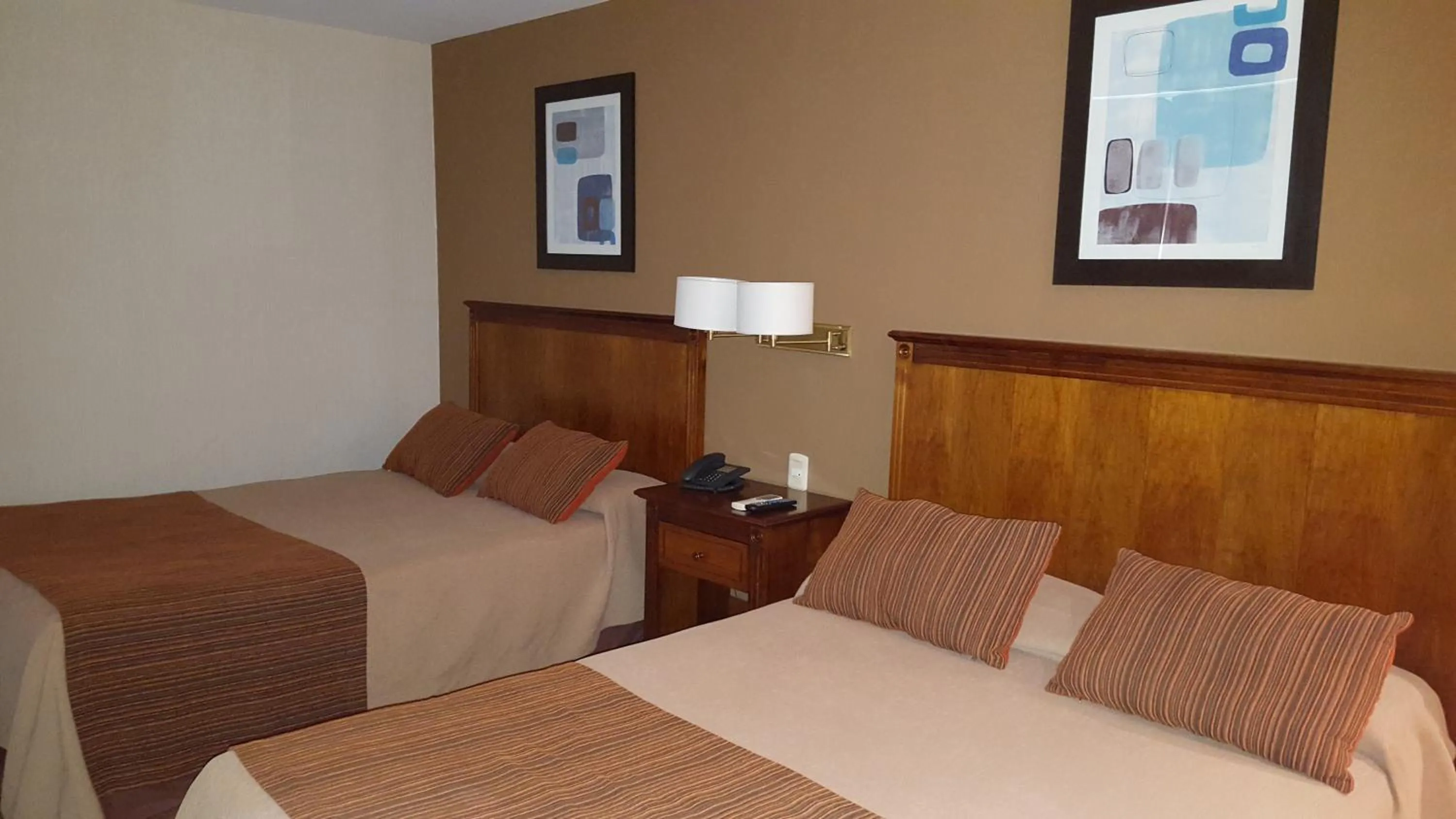 Bed in Howard Johnson by Wyndham San Pedro