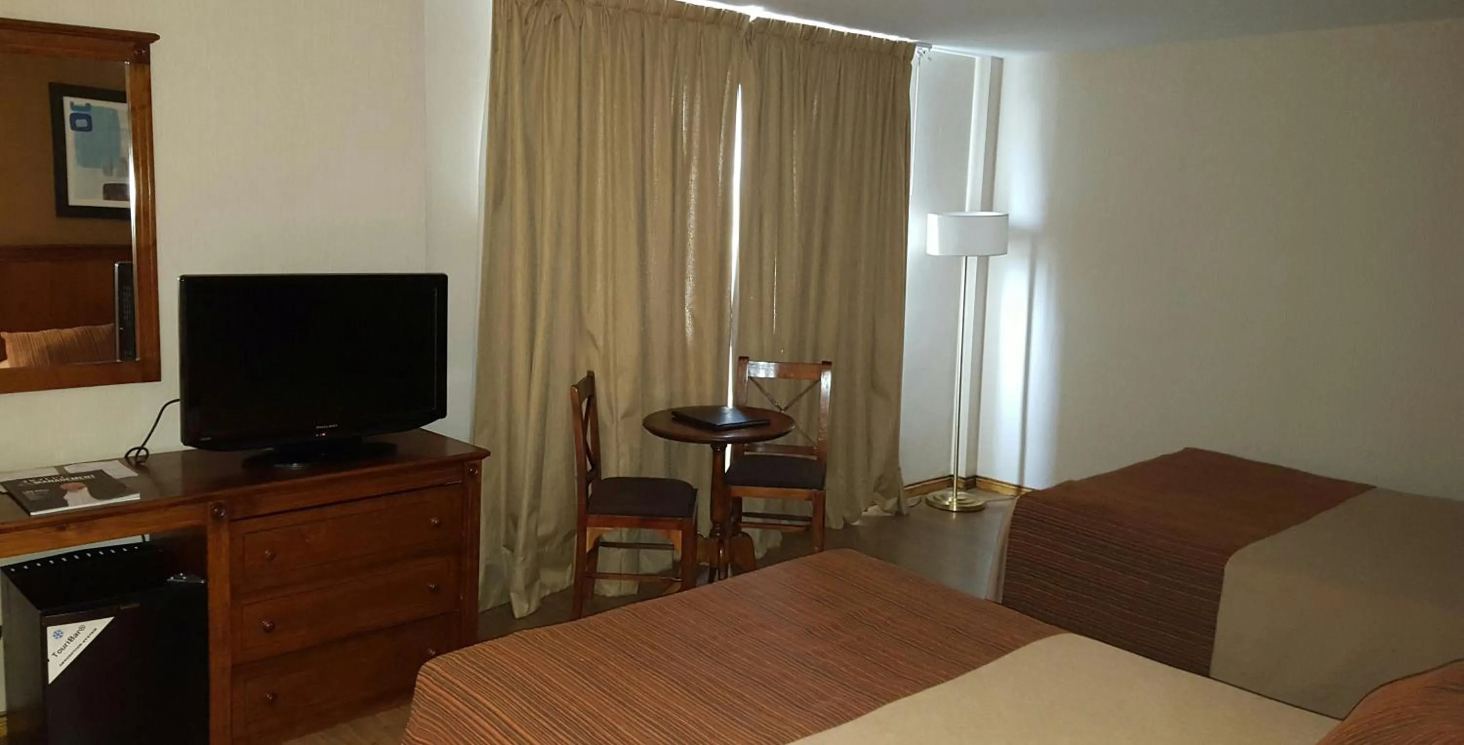 Photo of the whole room, Bed in Howard Johnson by Wyndham San Pedro