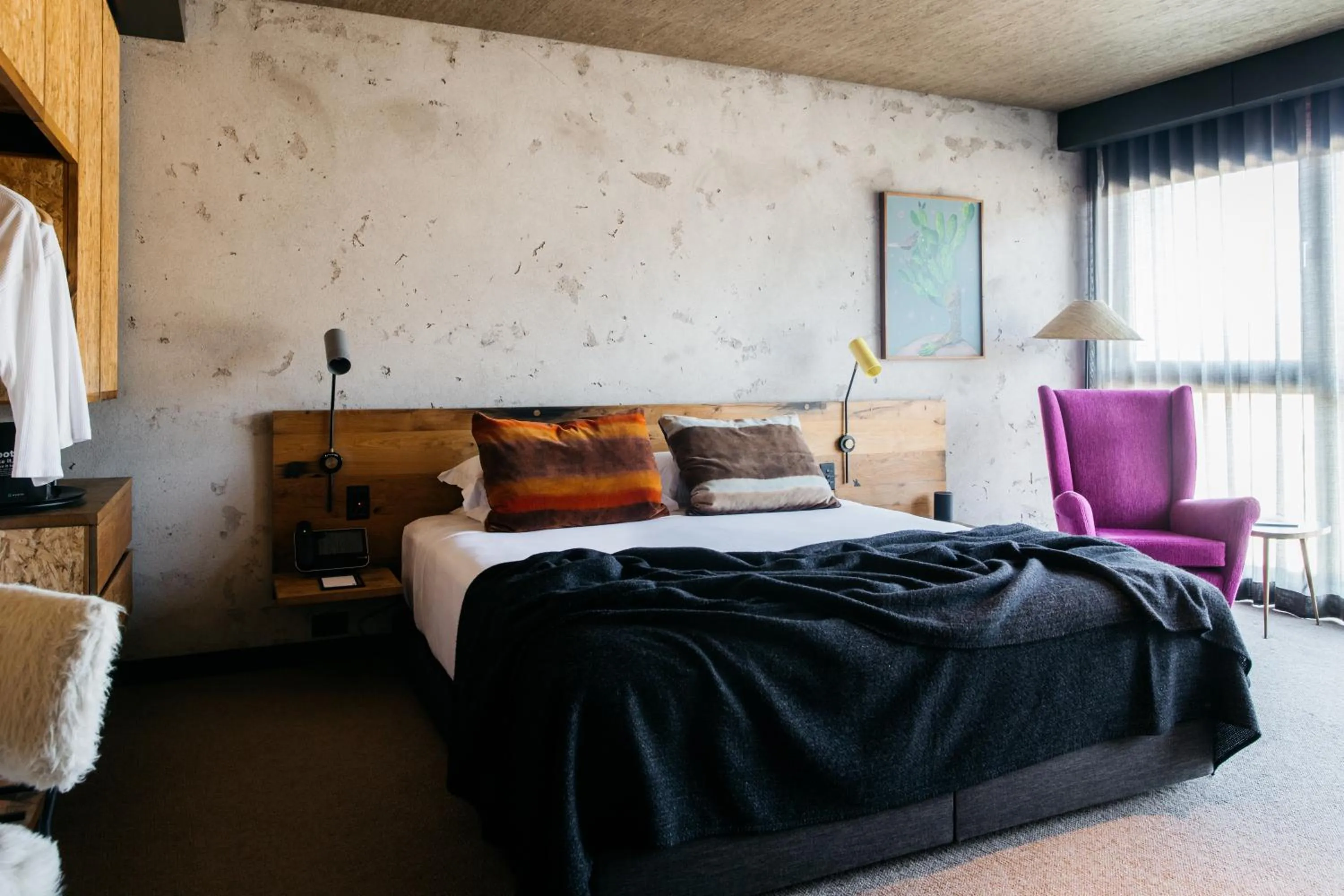 Bed in Ovolo Canberra, a Wyndham Hotel