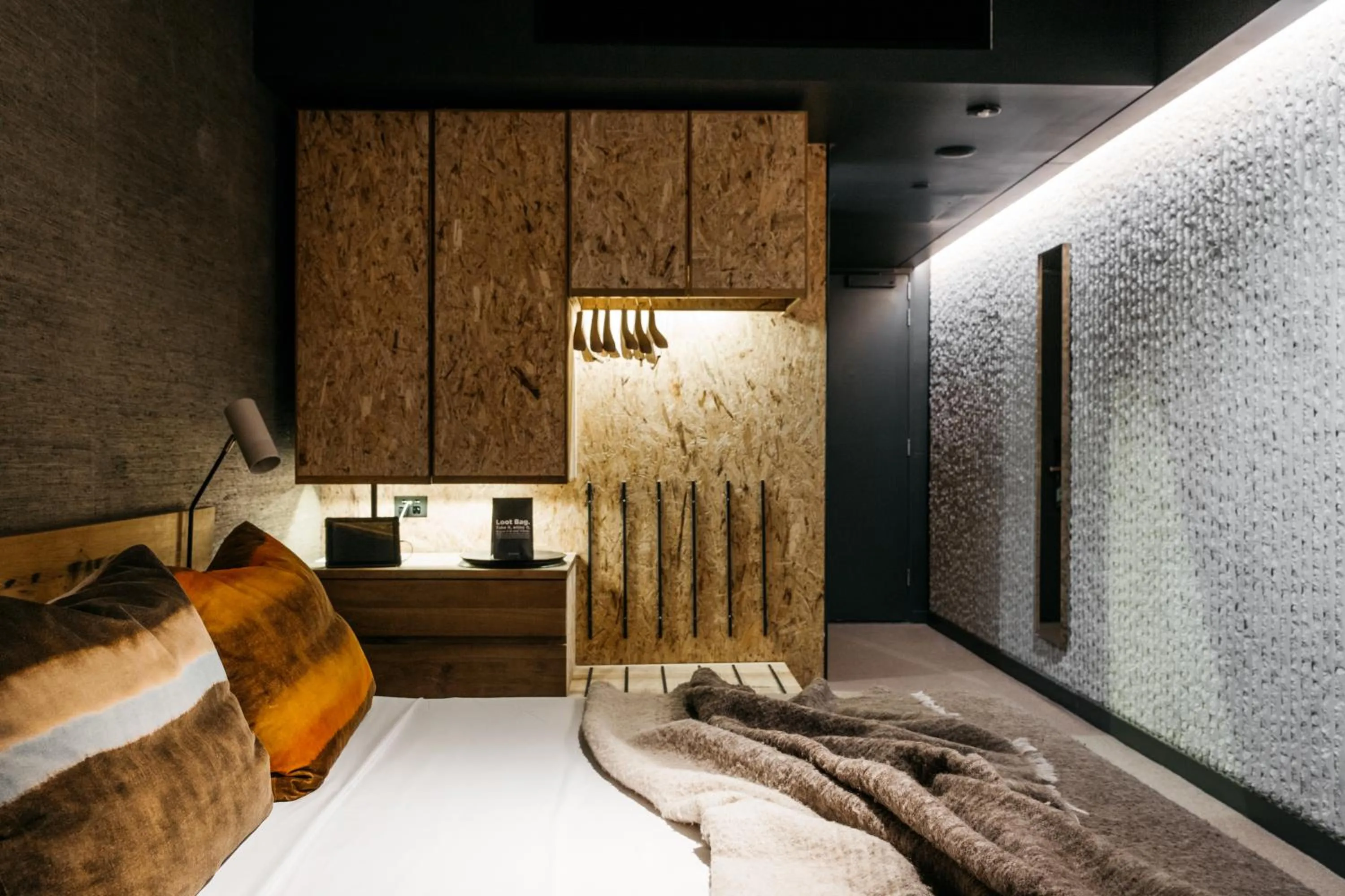 Bed in Ovolo Canberra, a Wyndham Hotel