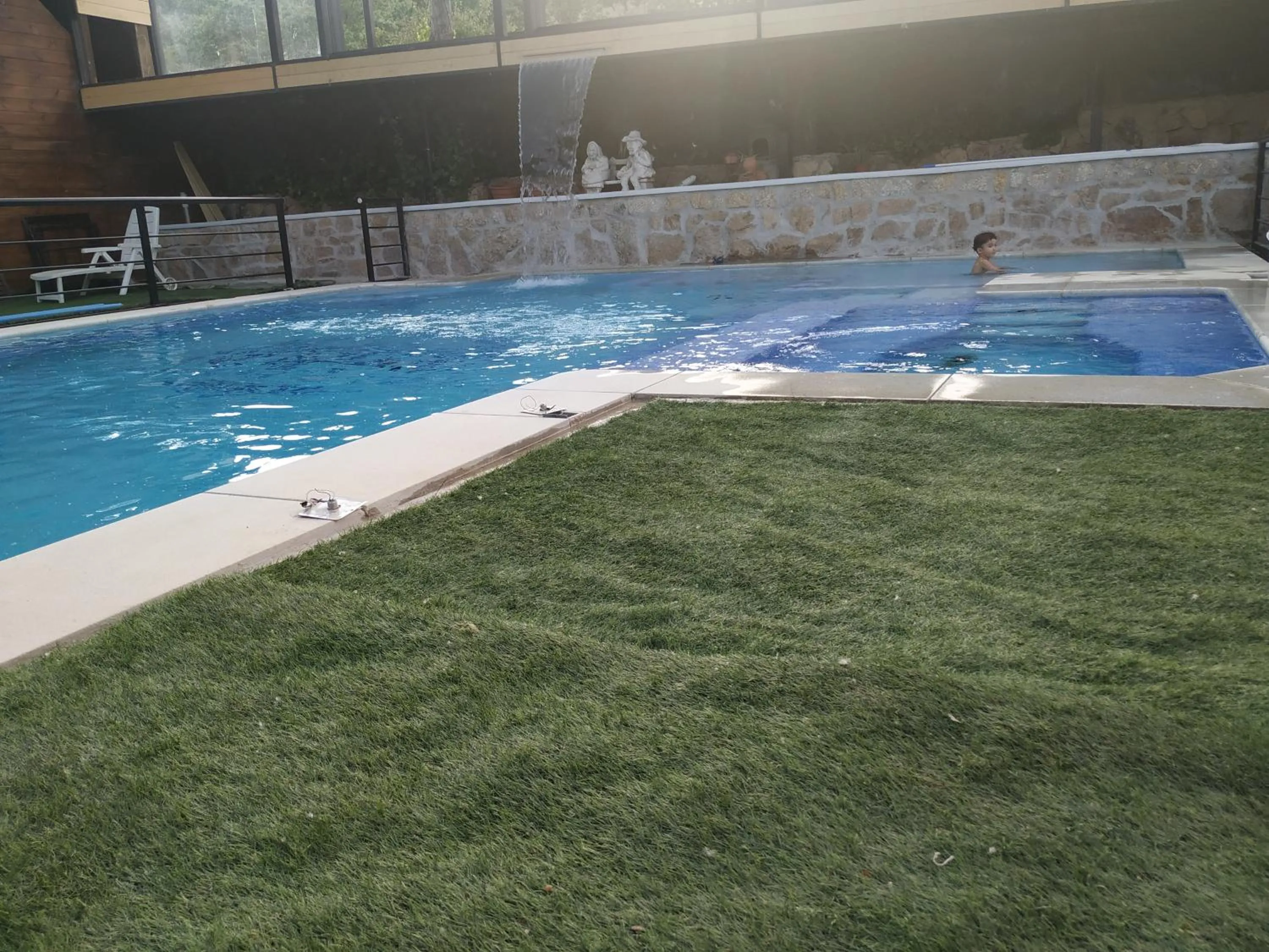 Swimming pool in Posada Rural SPA Granja LA TEJERA de Lozoya