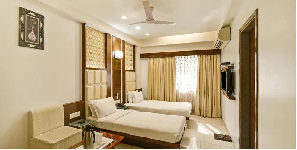 Bed in Atithi The Hotel