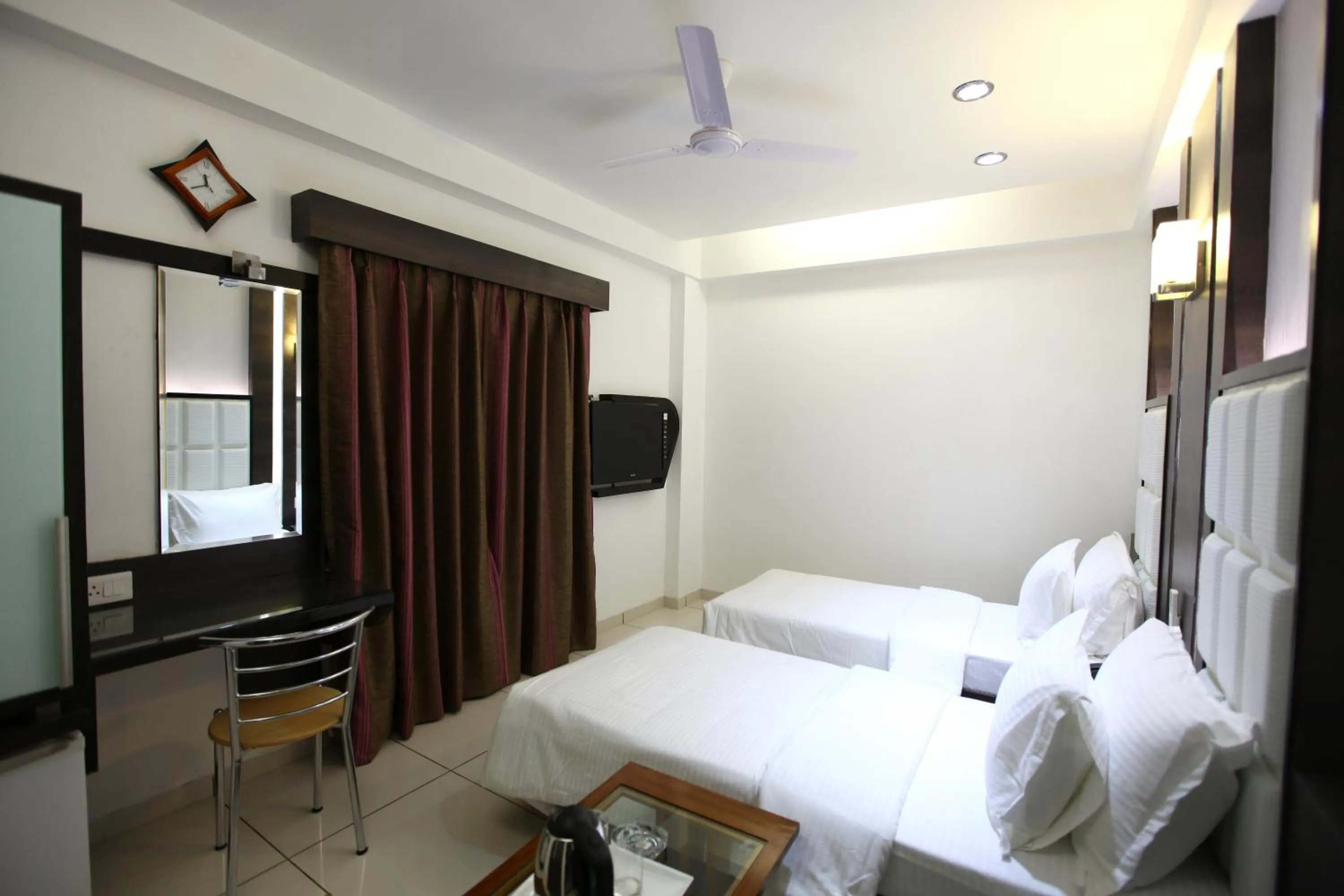 Photo of the whole room, Bed in Atithi The Hotel