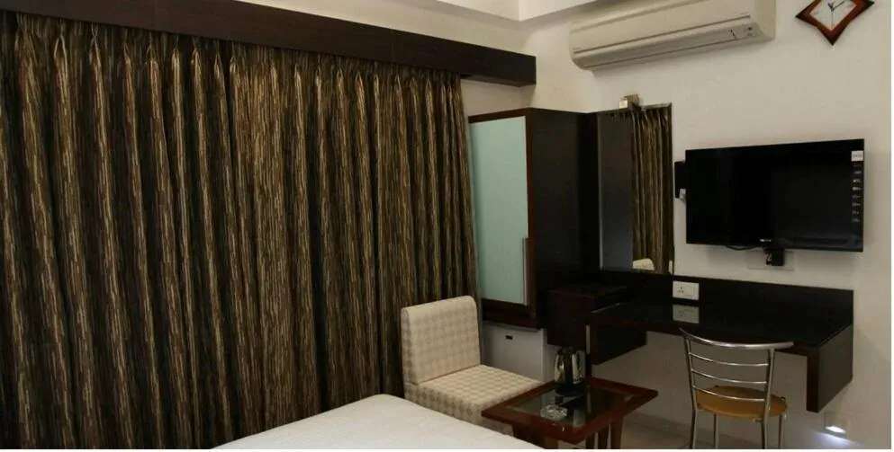 Bed in Atithi The Hotel