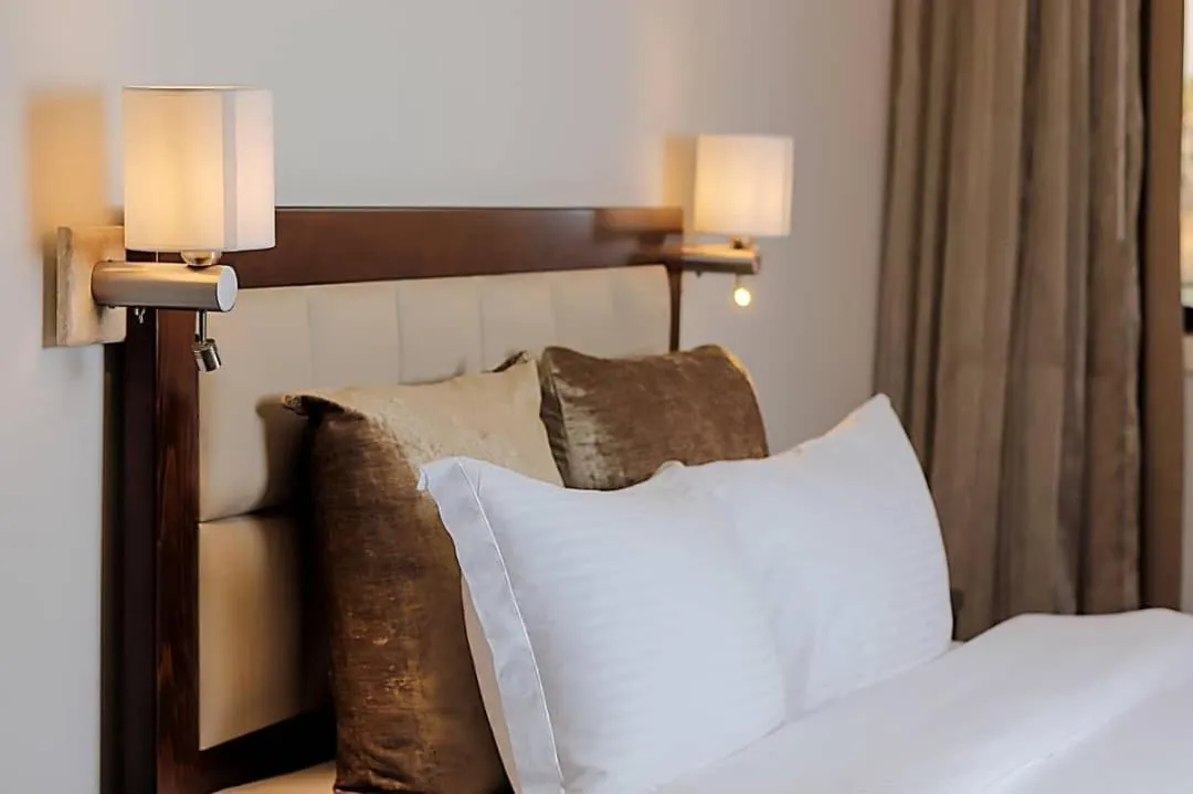 Bed in Mamba Point Hotel