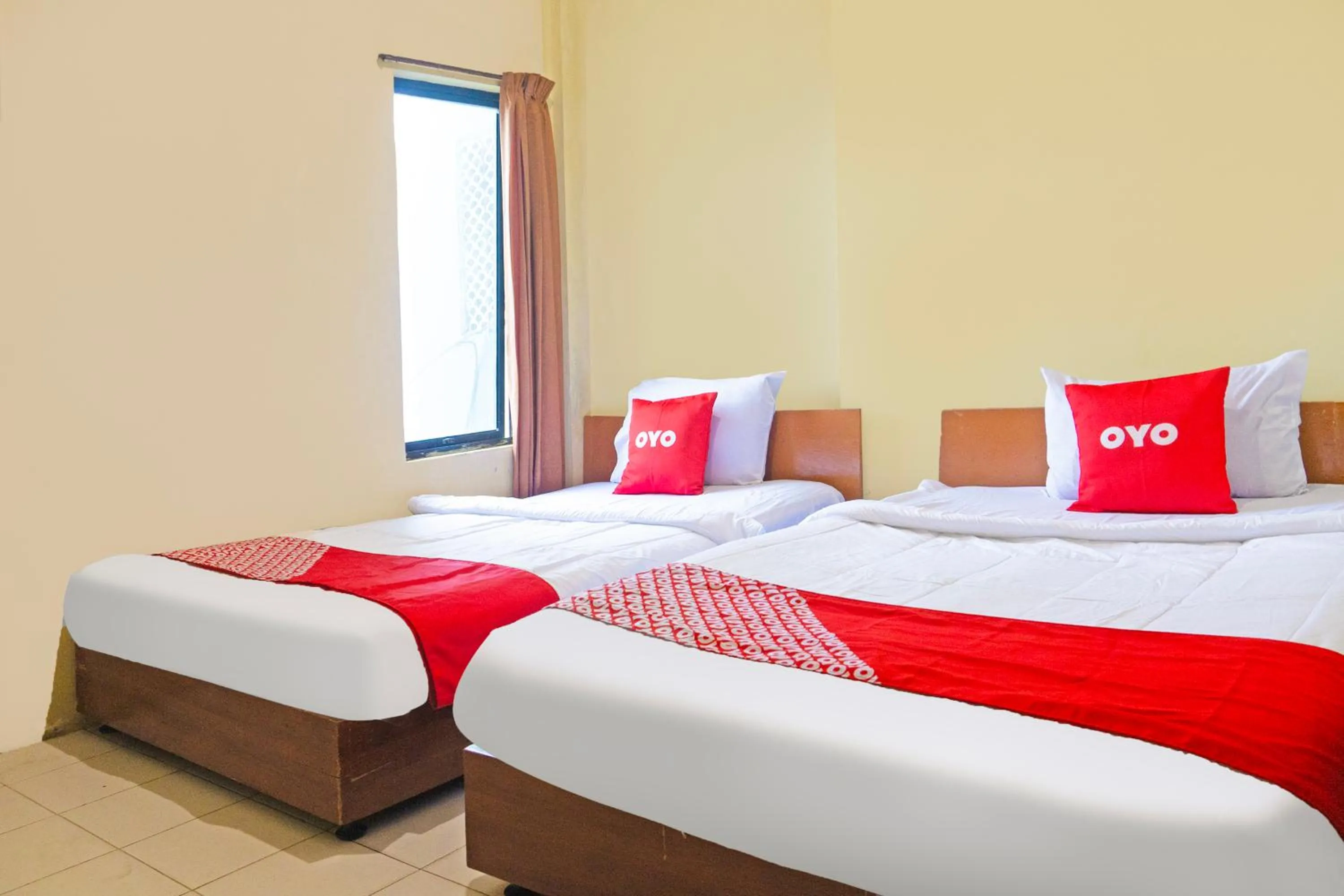 Photo of the whole room, Bed in Hotel O Bandar Lampung Near Teropong Kota Bukit Cindy Formerly Divka Residence