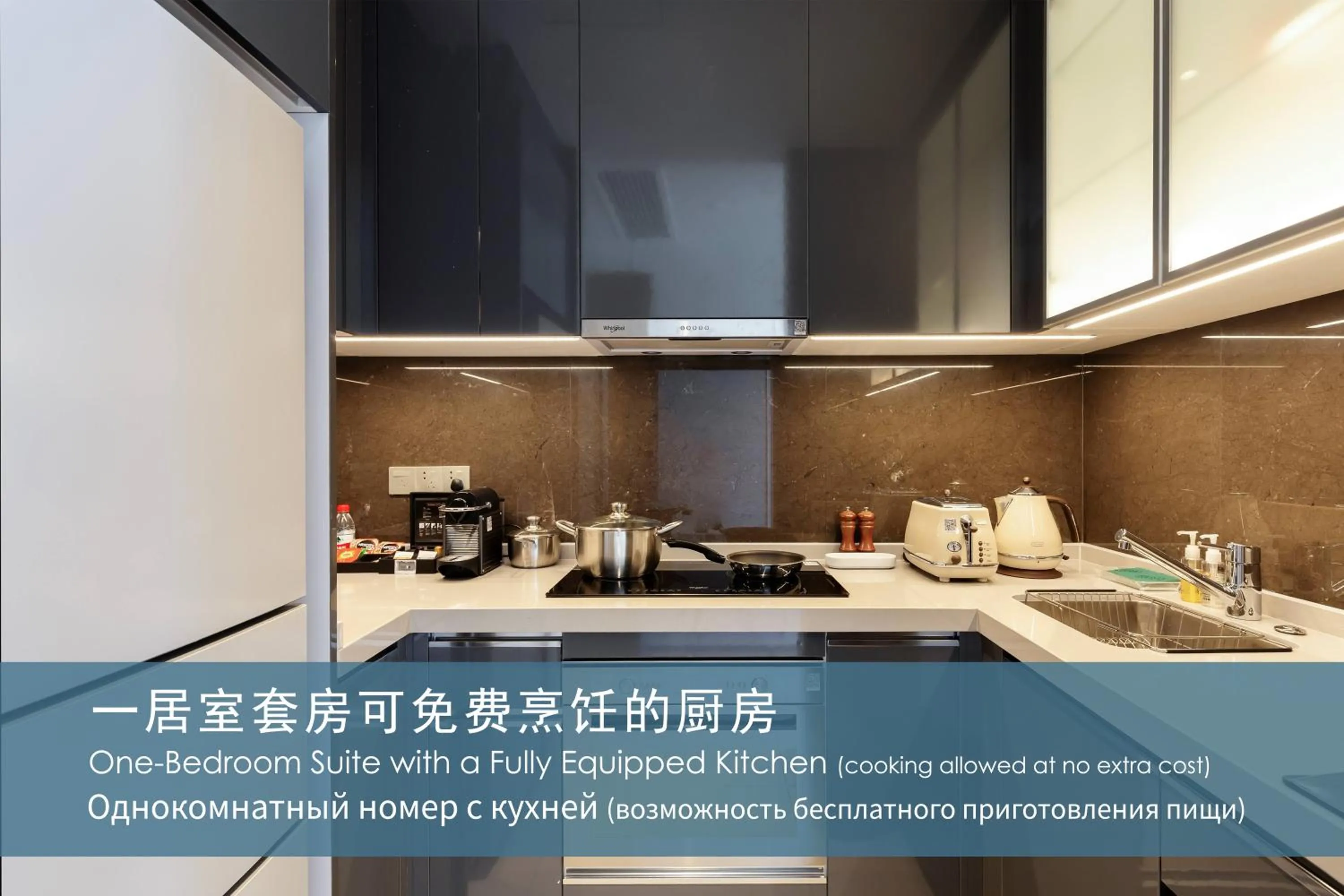 Kitchen or kitchenette in Oakwood Apartments Sanya