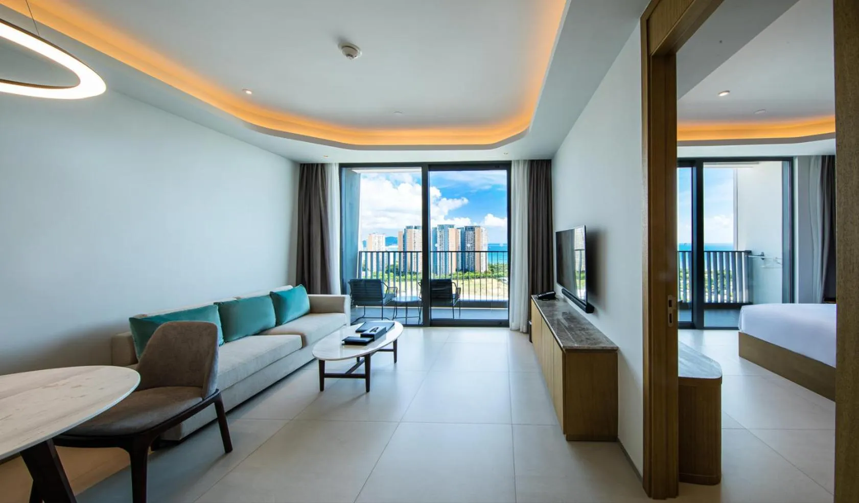 Living room, Bed in Oakwood Apartments Sanya
