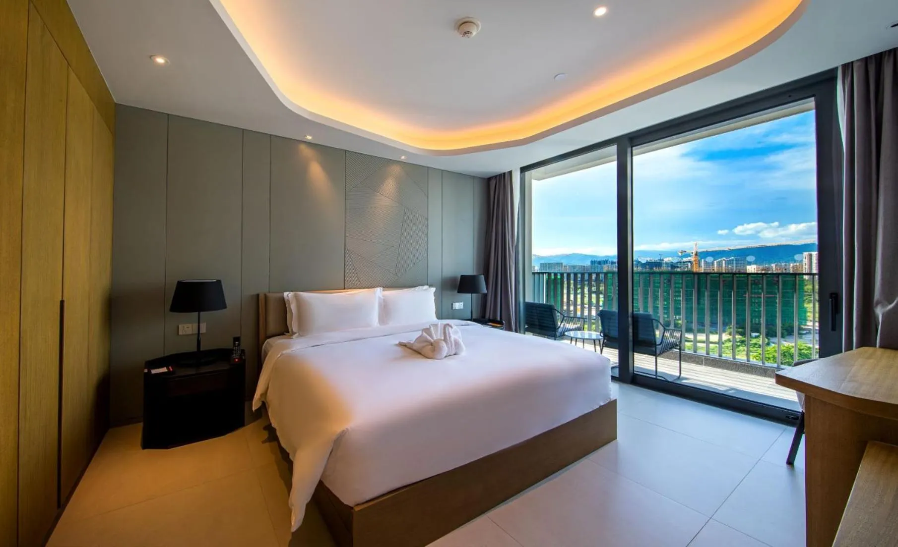 Bedroom, Bed in Oakwood Apartments Sanya