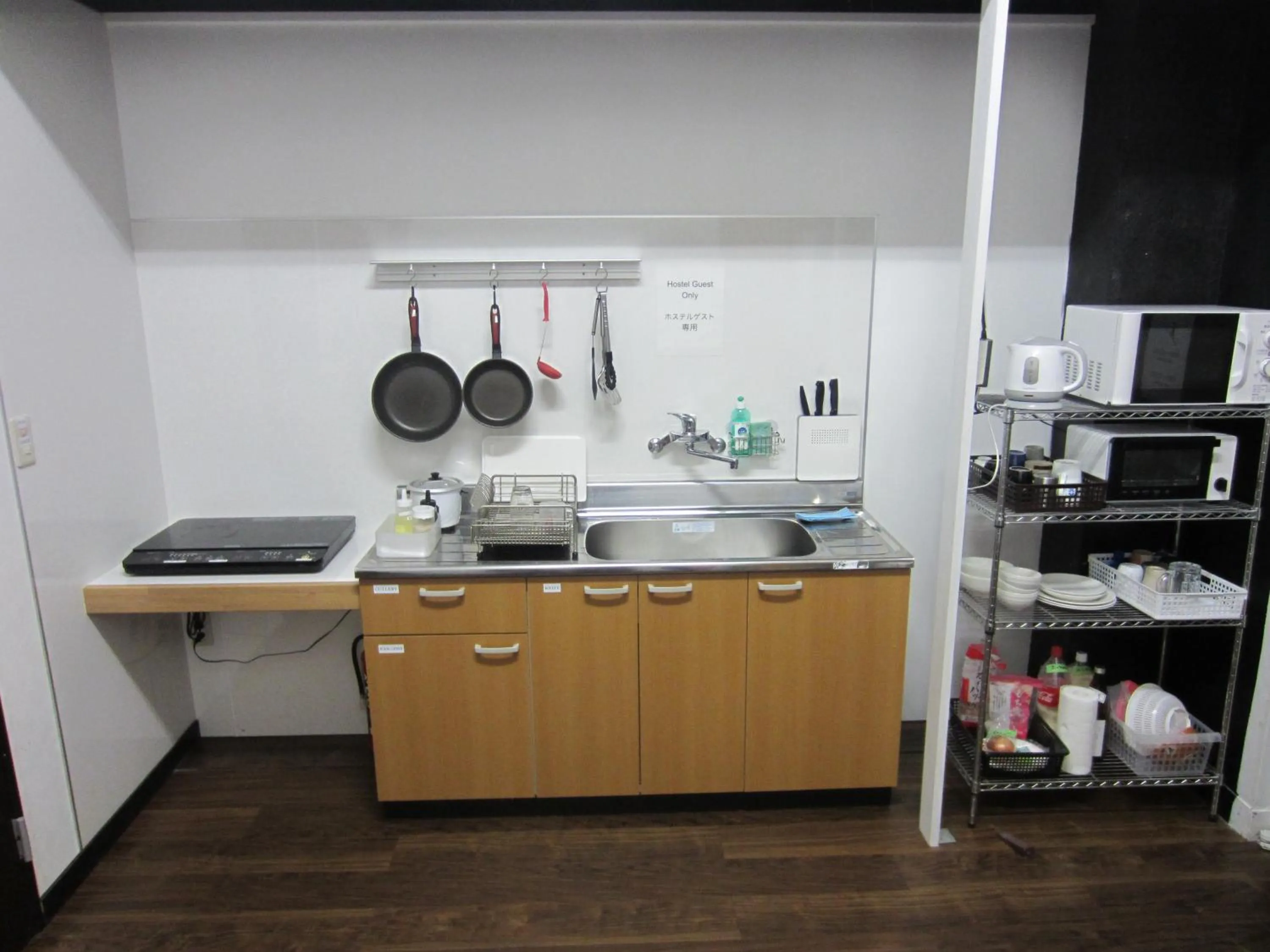 Communal kitchen in Nomad Hostel East