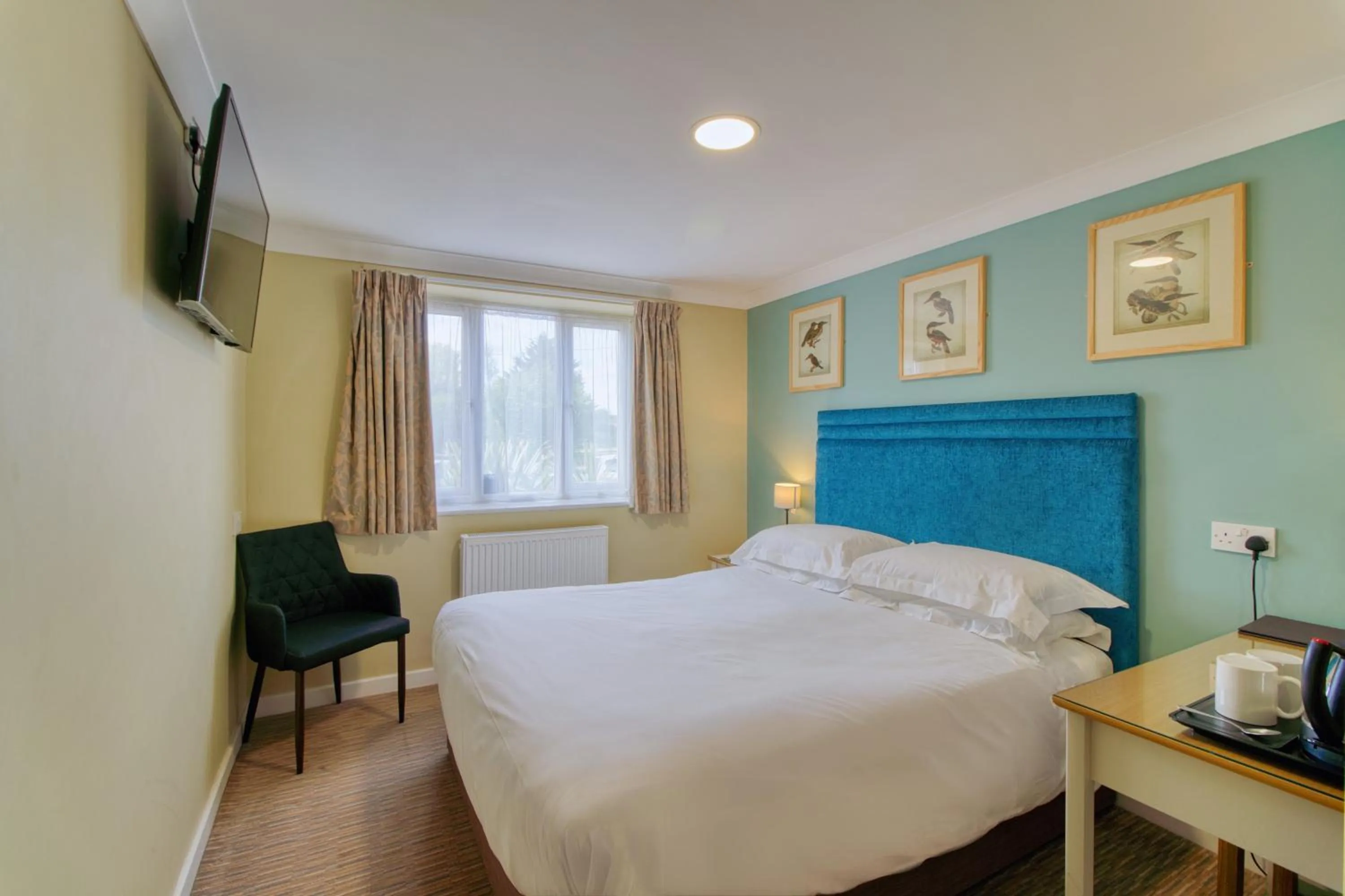 Bed in The Bridge House; BW Signature Collection