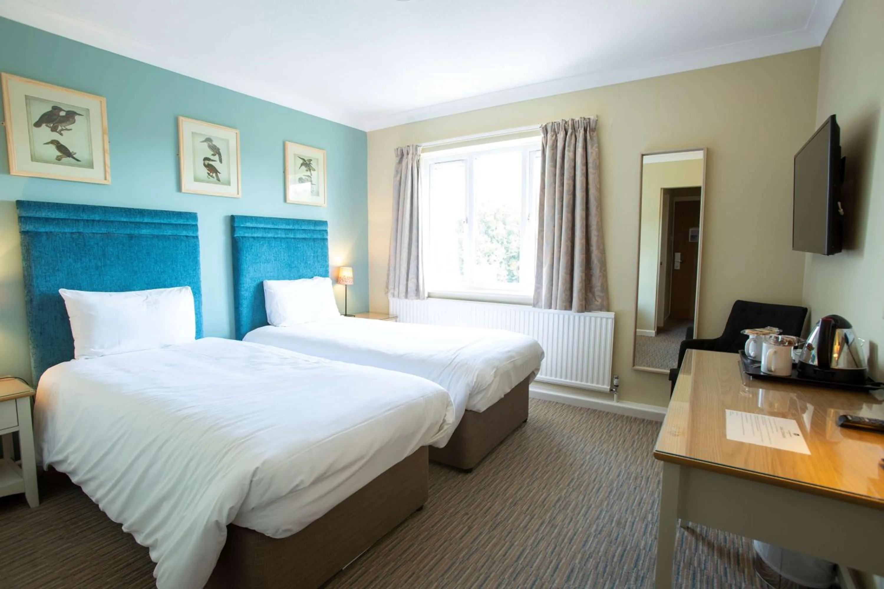 Bed in The Bridge House; BW Signature Collection