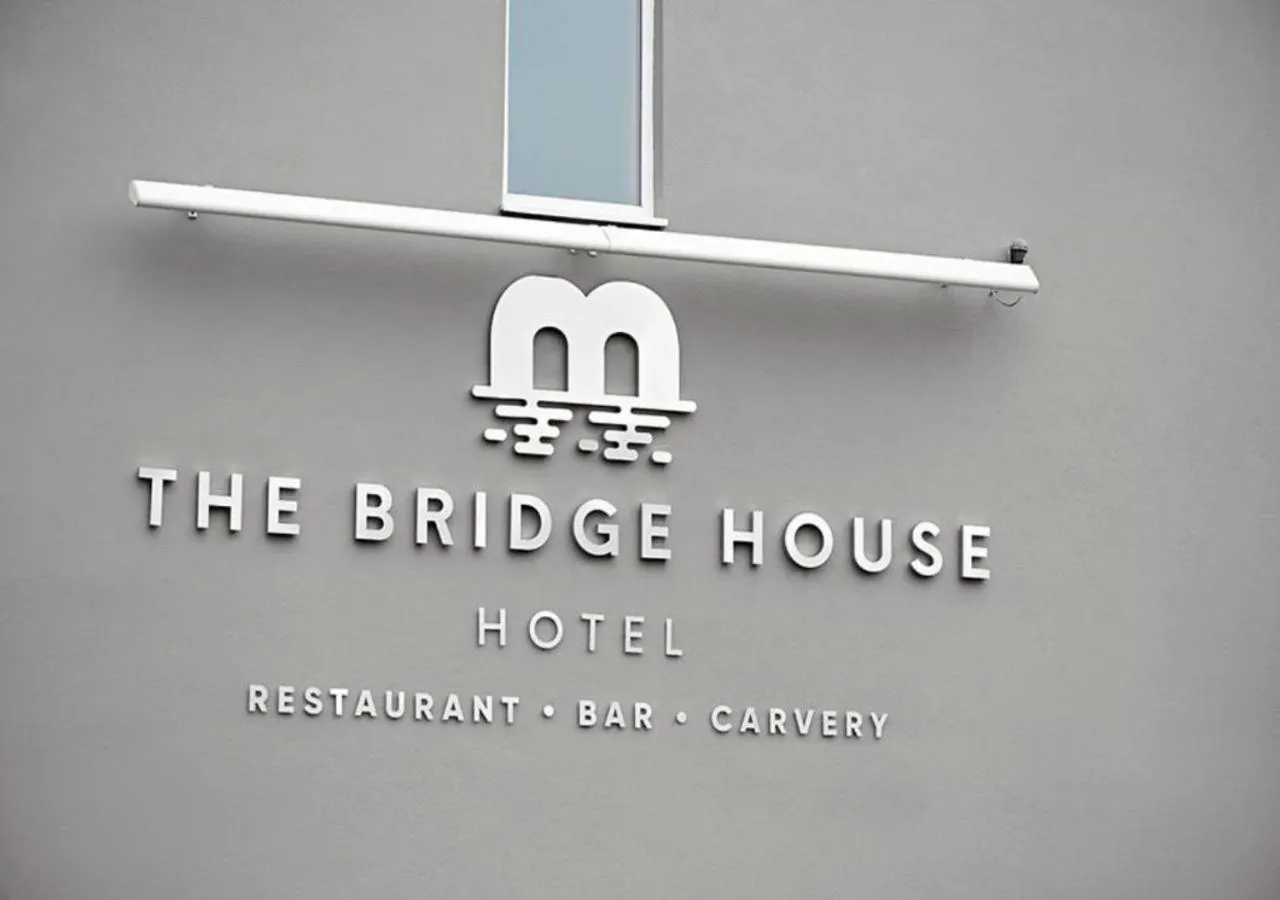 Property logo or sign in The Bridge House; BW Signature Collection