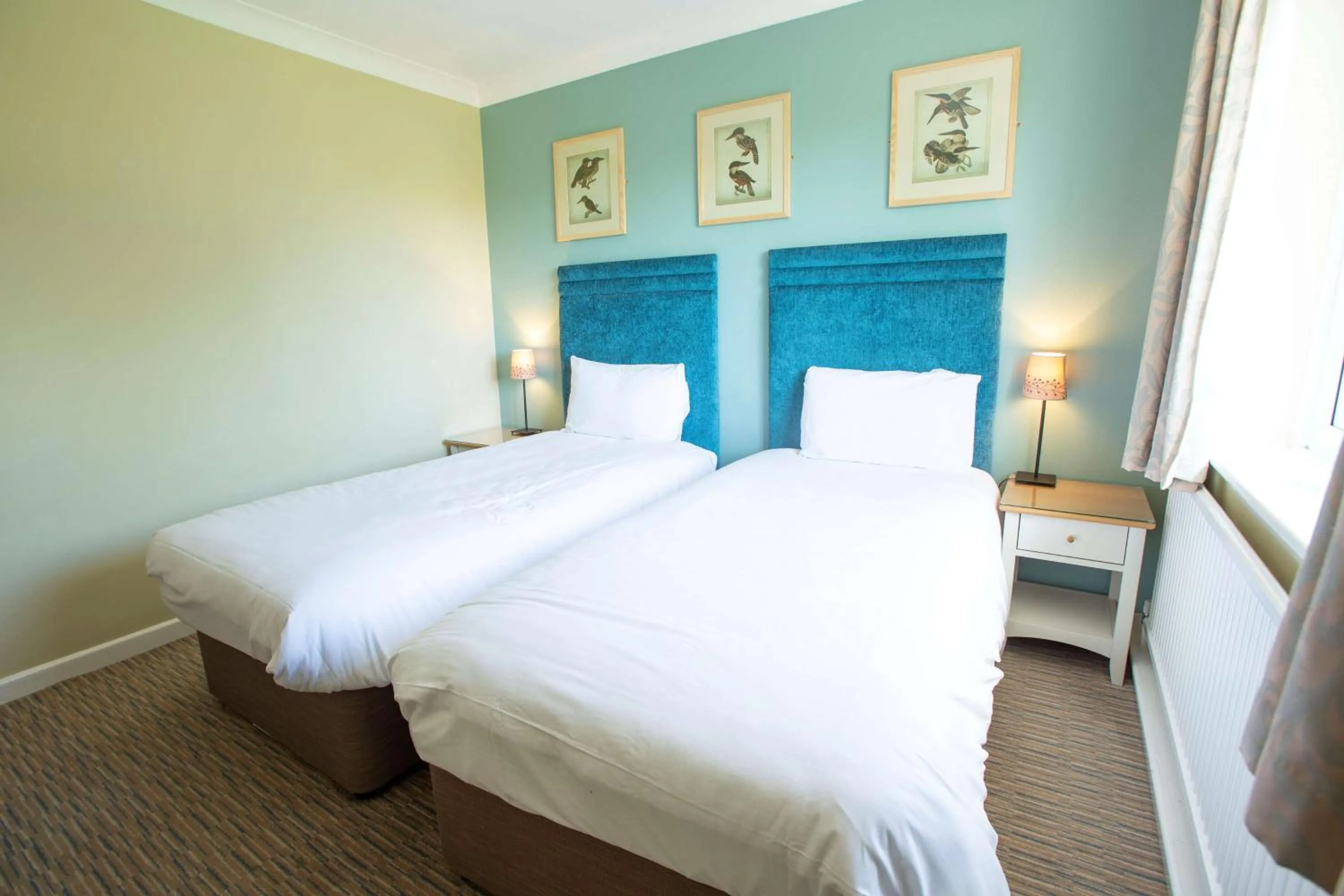 Bed in The Bridge House; BW Signature Collection