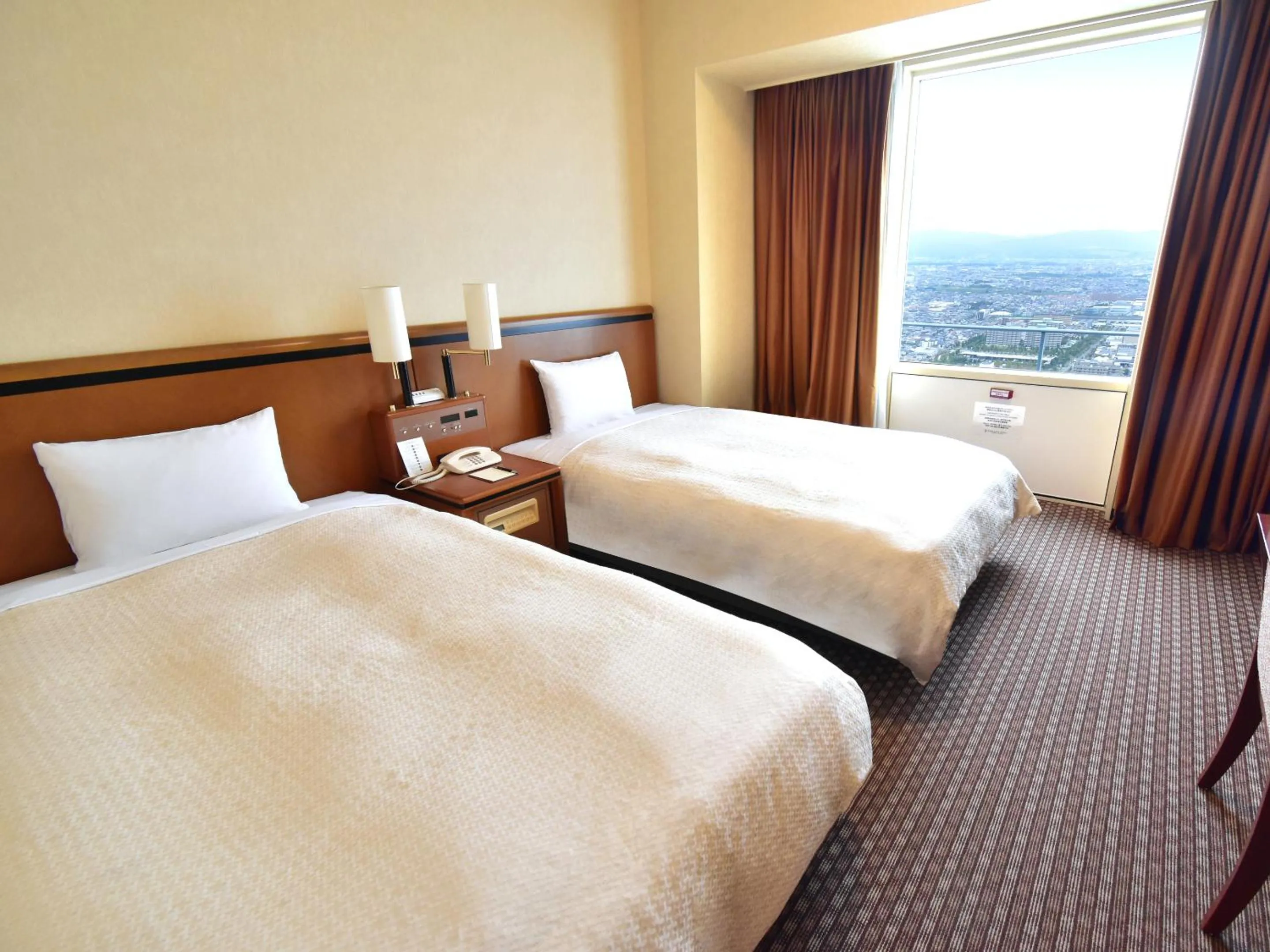 Photo of the whole room, Bed in Star Gate Hotel Kansai Airport
