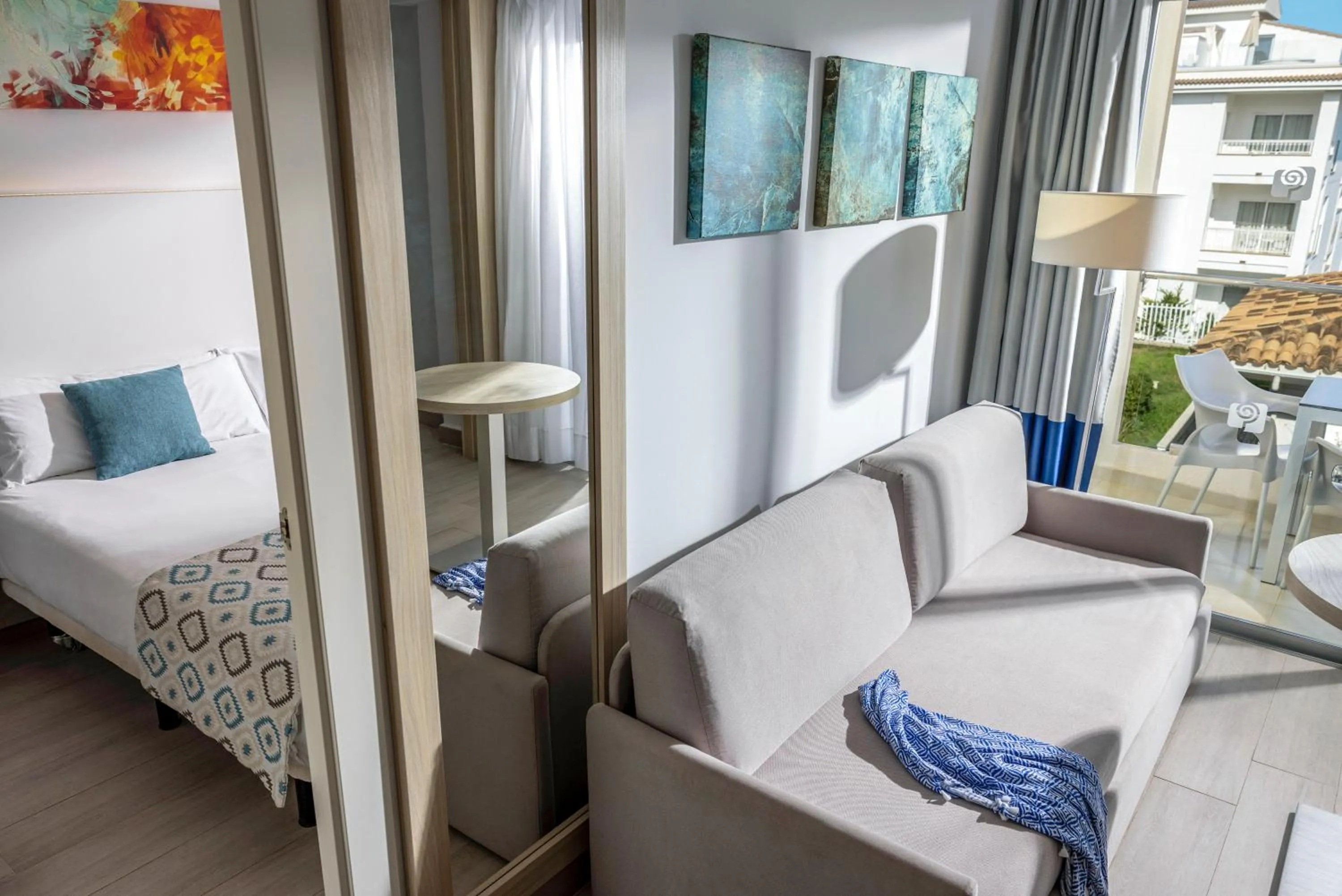 Living room, Bed in Grupotel Alcudia Pins