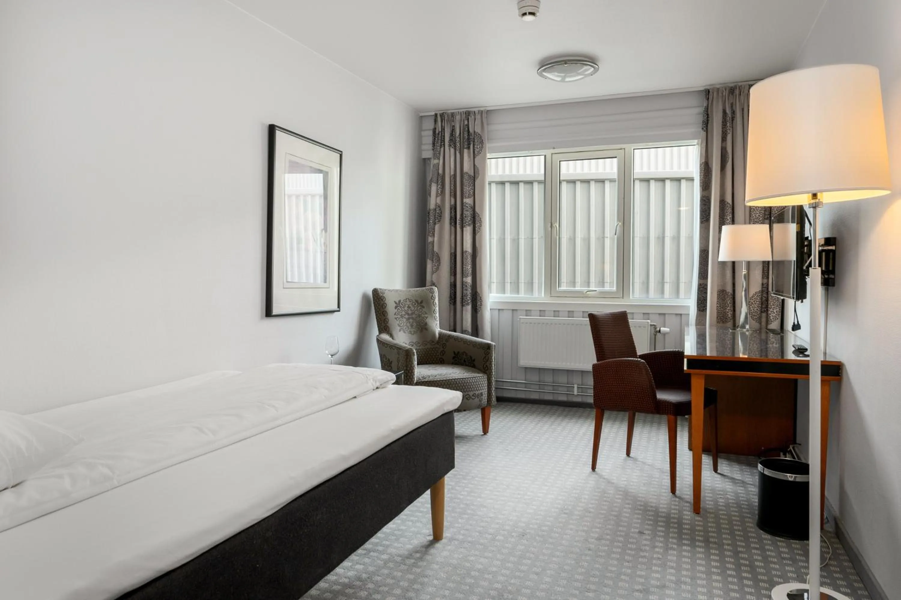 Bed in Frichs Hotel Hamar