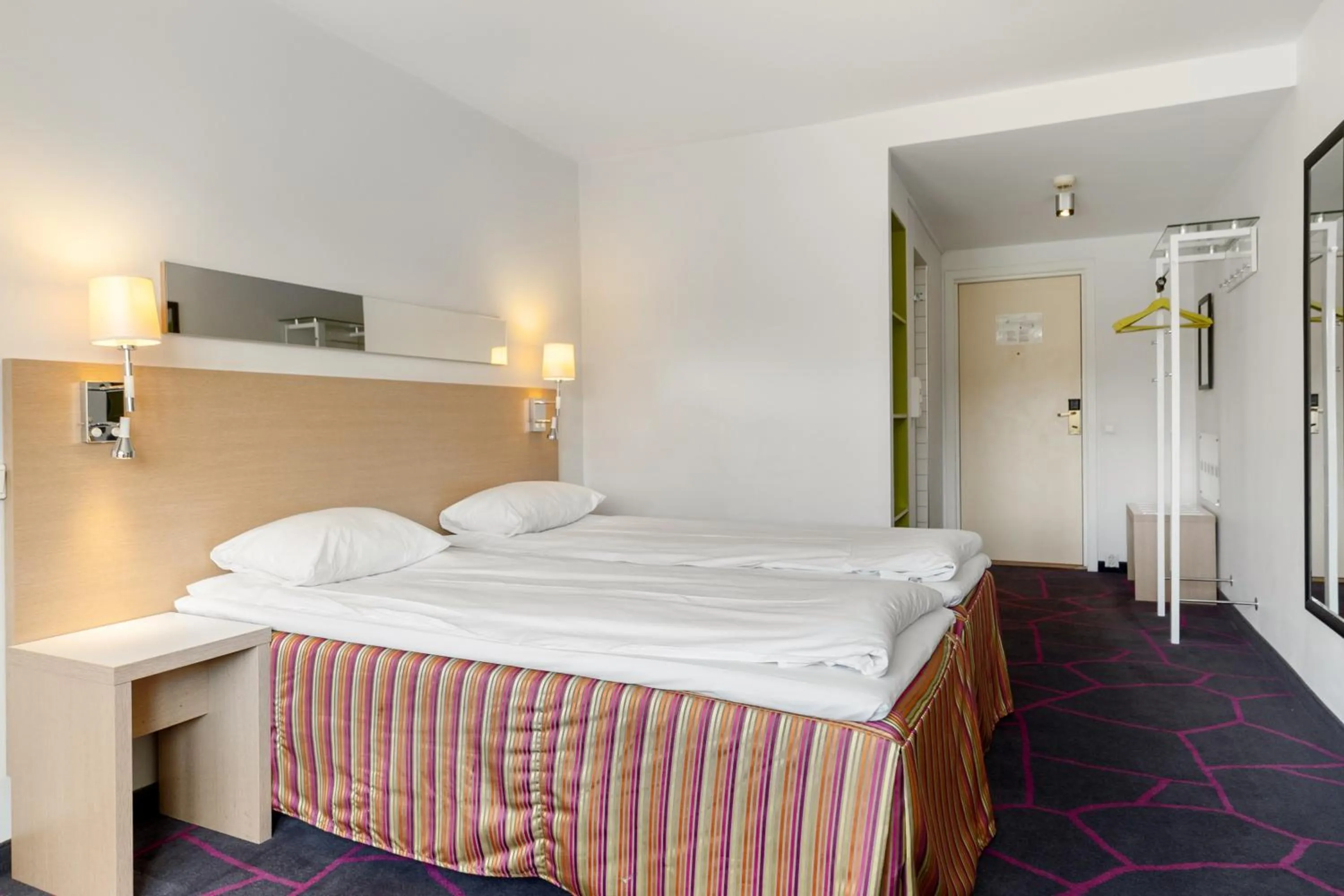 Bed in Frichs Hotel Hamar