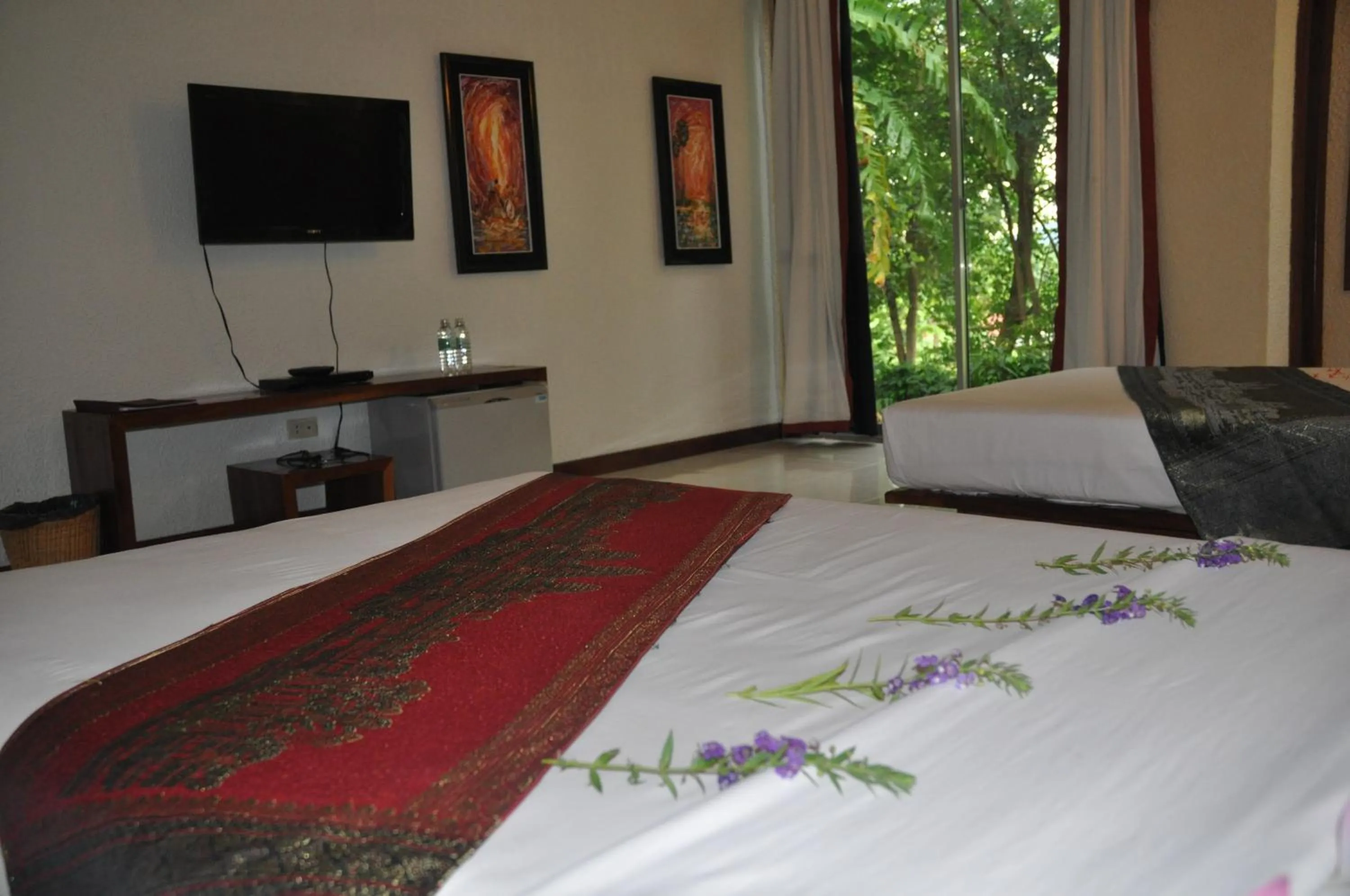 Bed in Memoria Palace & Resort
