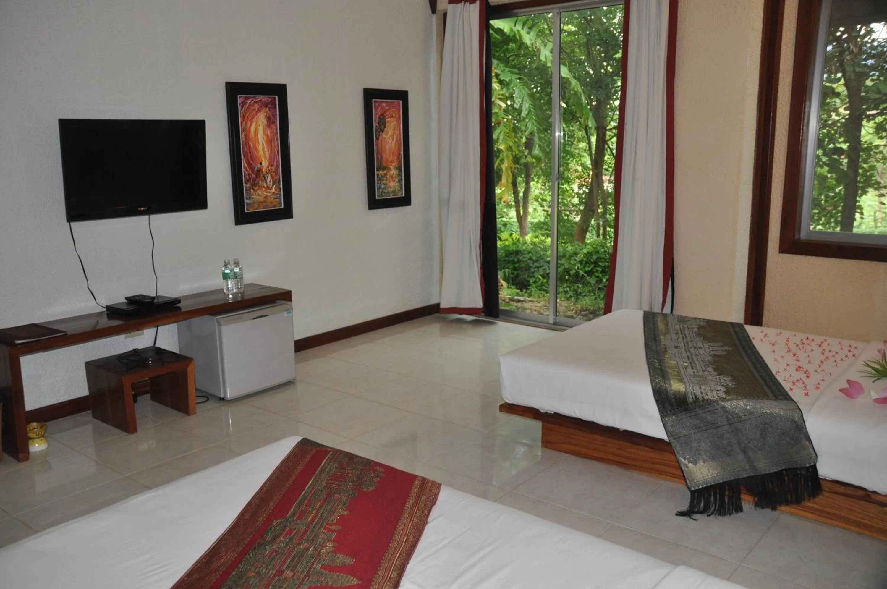 Bed in Memoria Palace & Resort